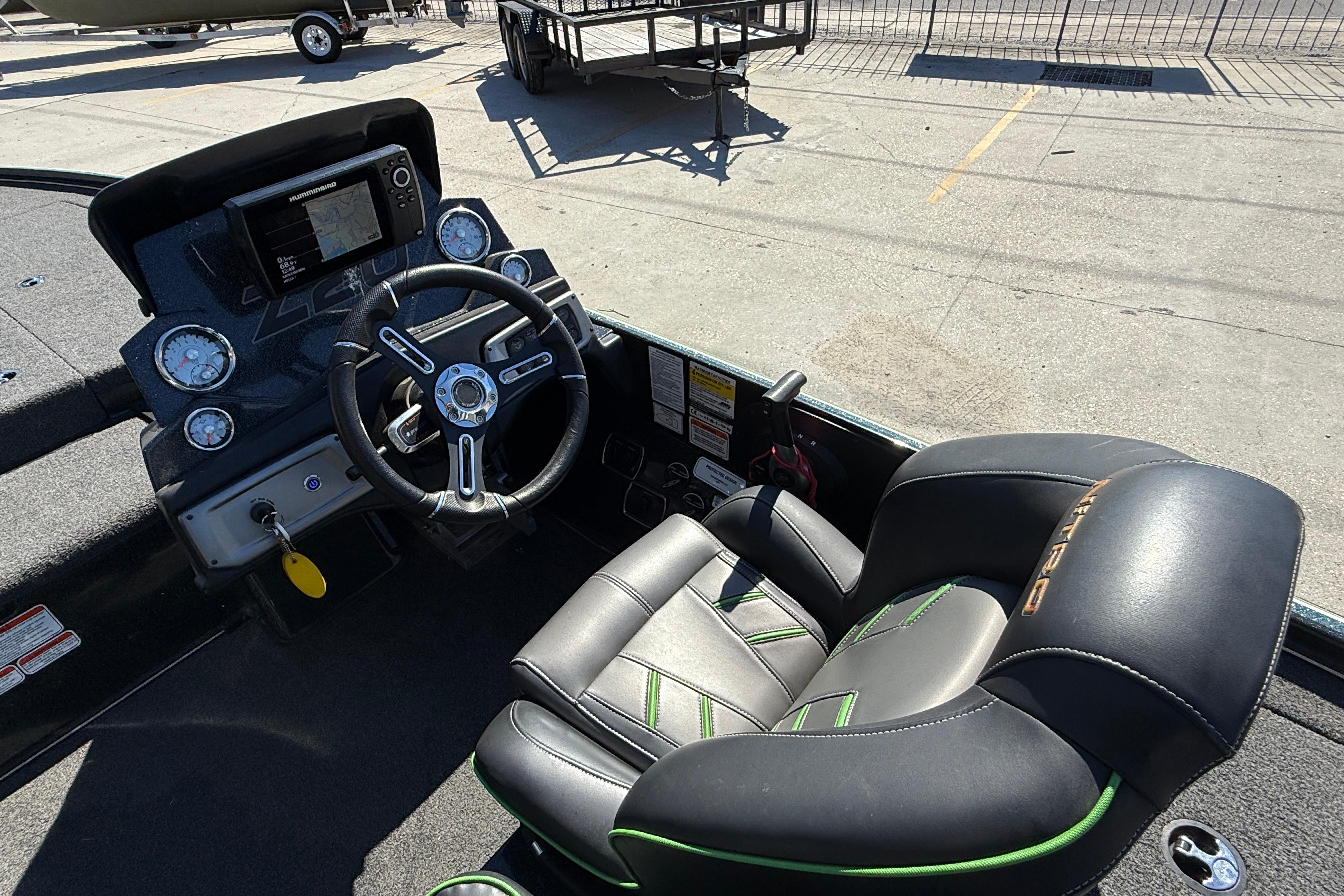 2020 Nitro Z20 boat cockpit with steering wheel and comfortable seat.