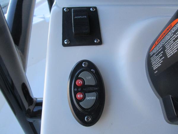 Control panel of 2025 Sea Pro 230 Bay boat with jackplate switch.