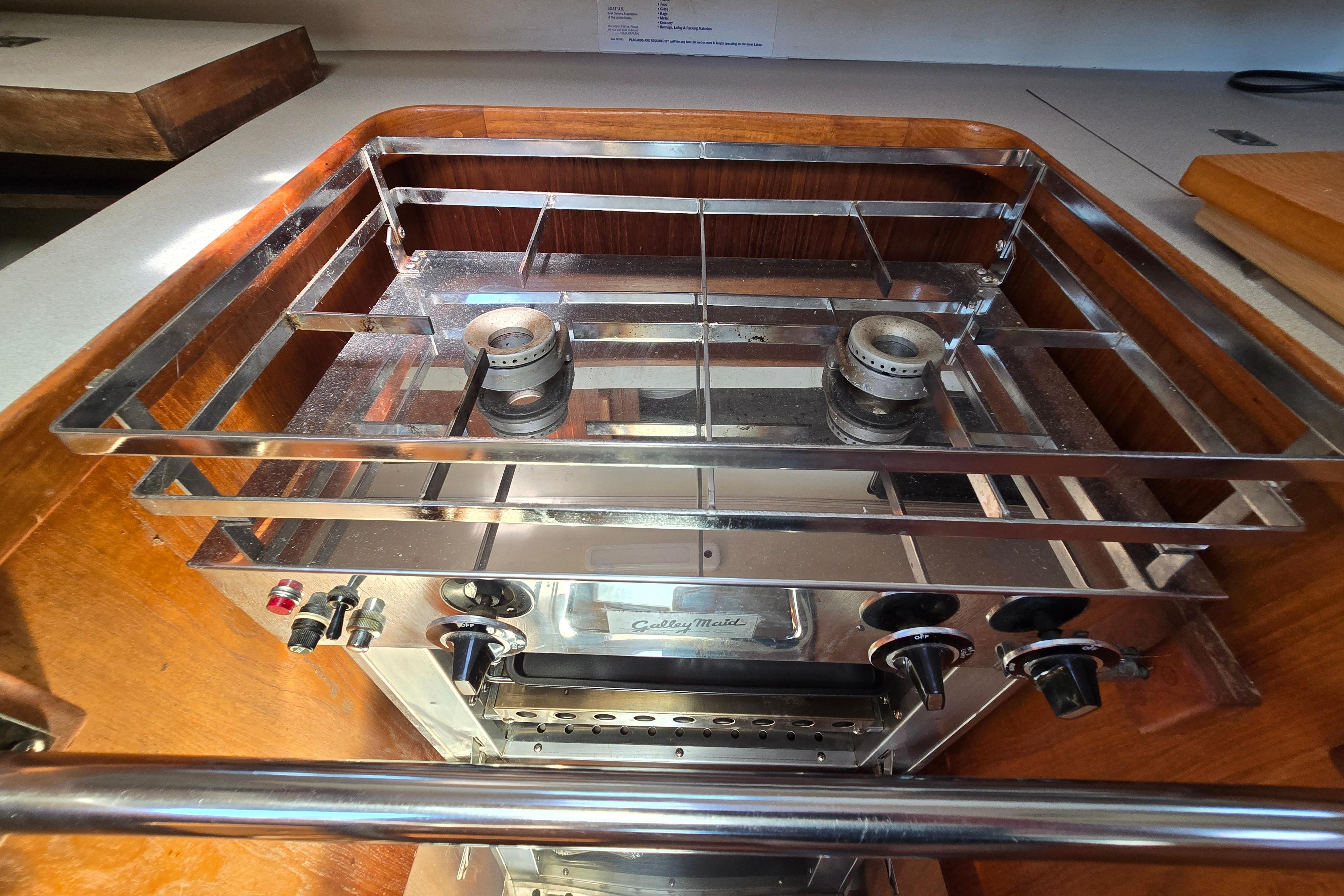 Stainless steel stove in a 1993 Caliber 35 yacht kitchen.