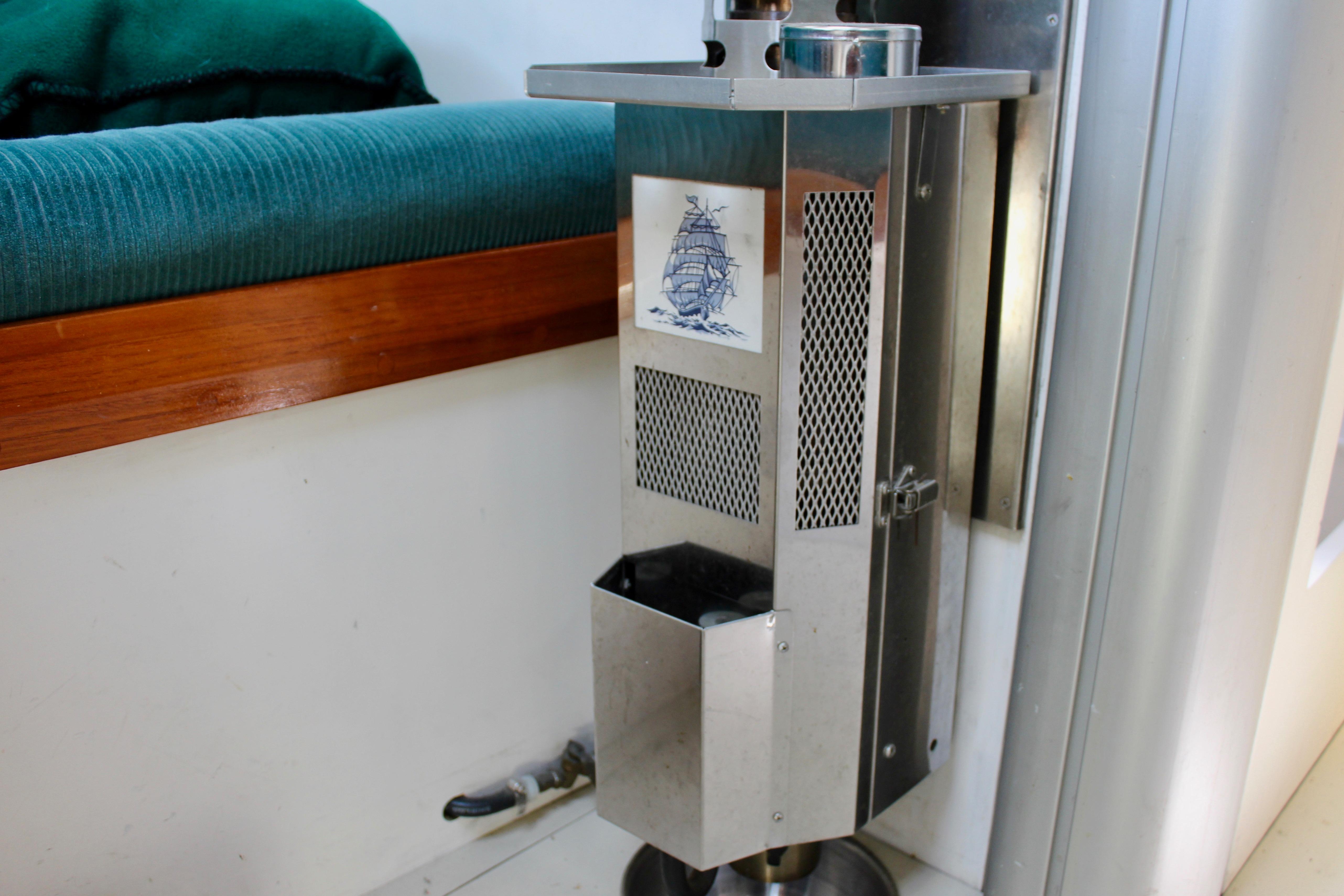 Stainless steel heater in a 1993 Freya 39 boat interior.