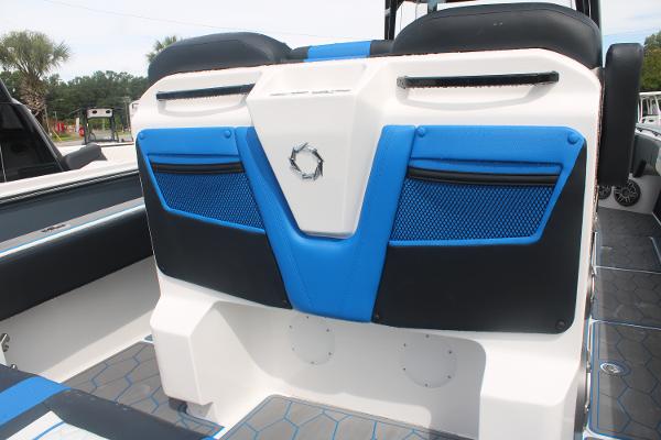 2024 Fountain 34 SC boat interior with blue and black seating design.