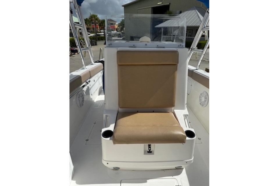 2005 Dakota 36 CC Forward Cuddy Cabin boat interior with tan seating and cup holders.