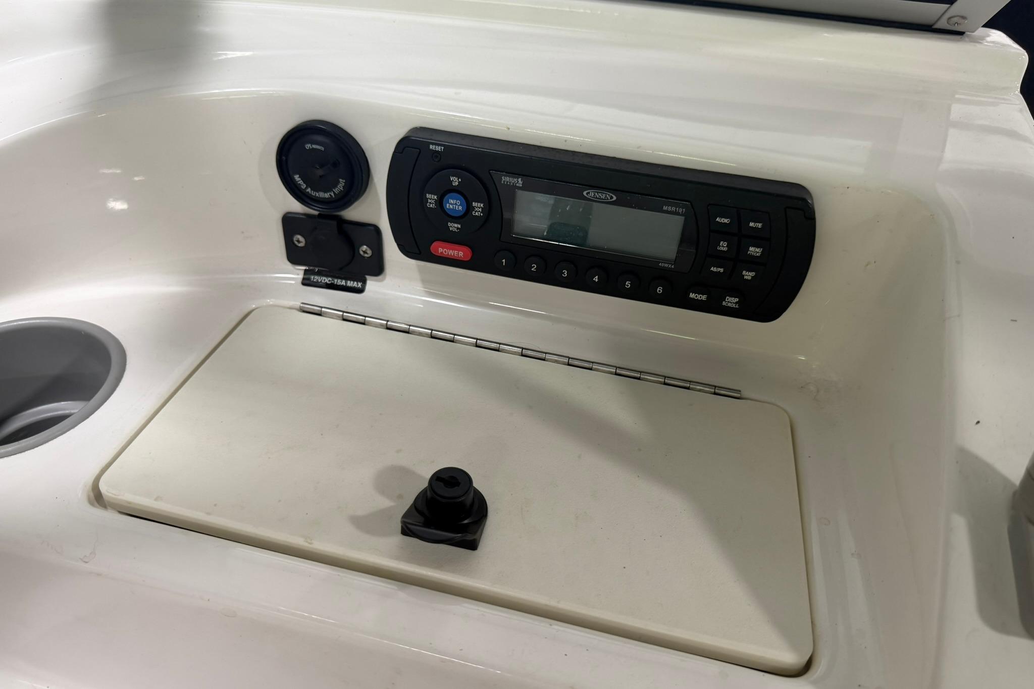 2012 Bayliner 175 Bowrider dashboard with stereo system and control panel.