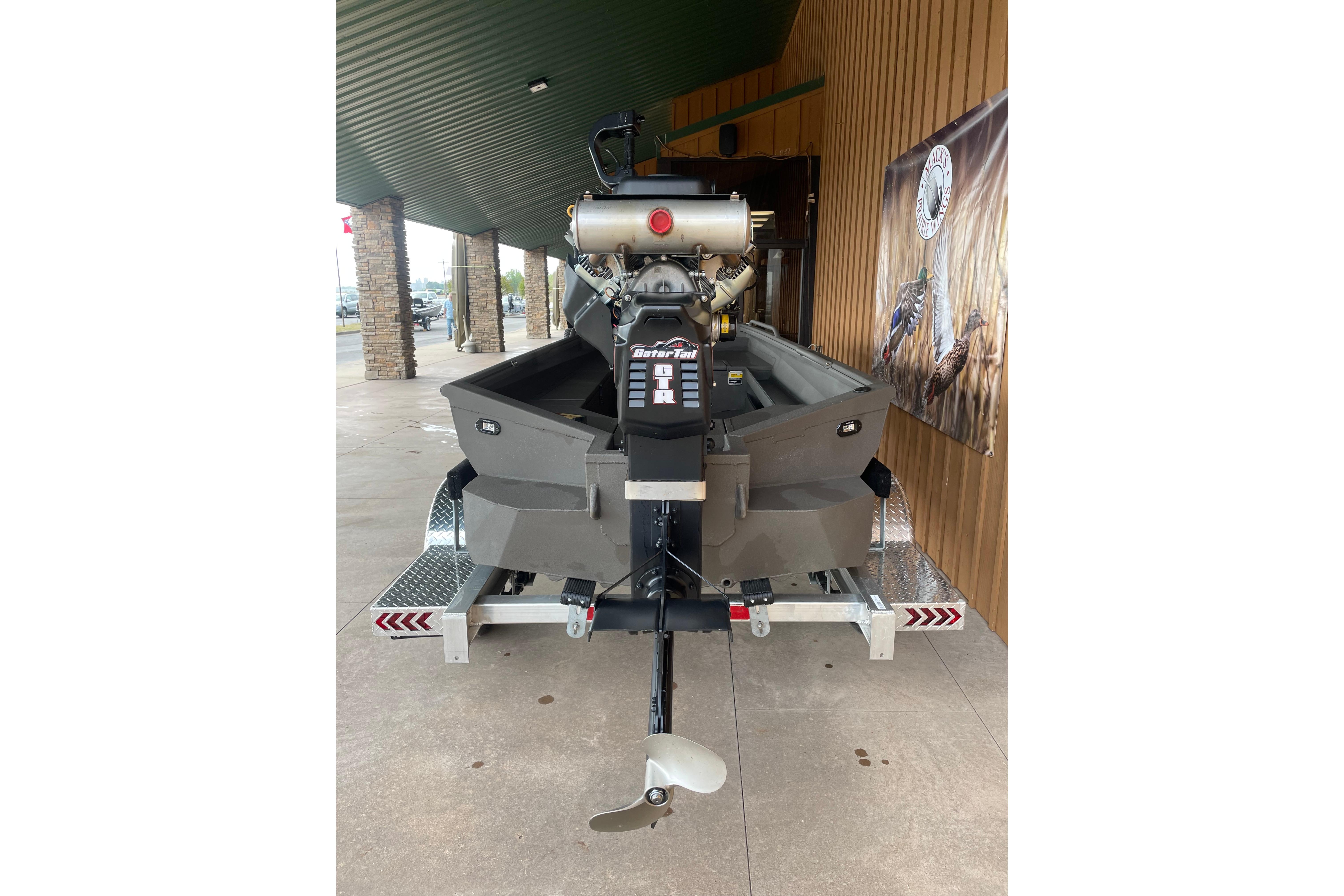 2026 Reaper Boats 753 Timber Reaper on trailer, rear view, outdoor display.