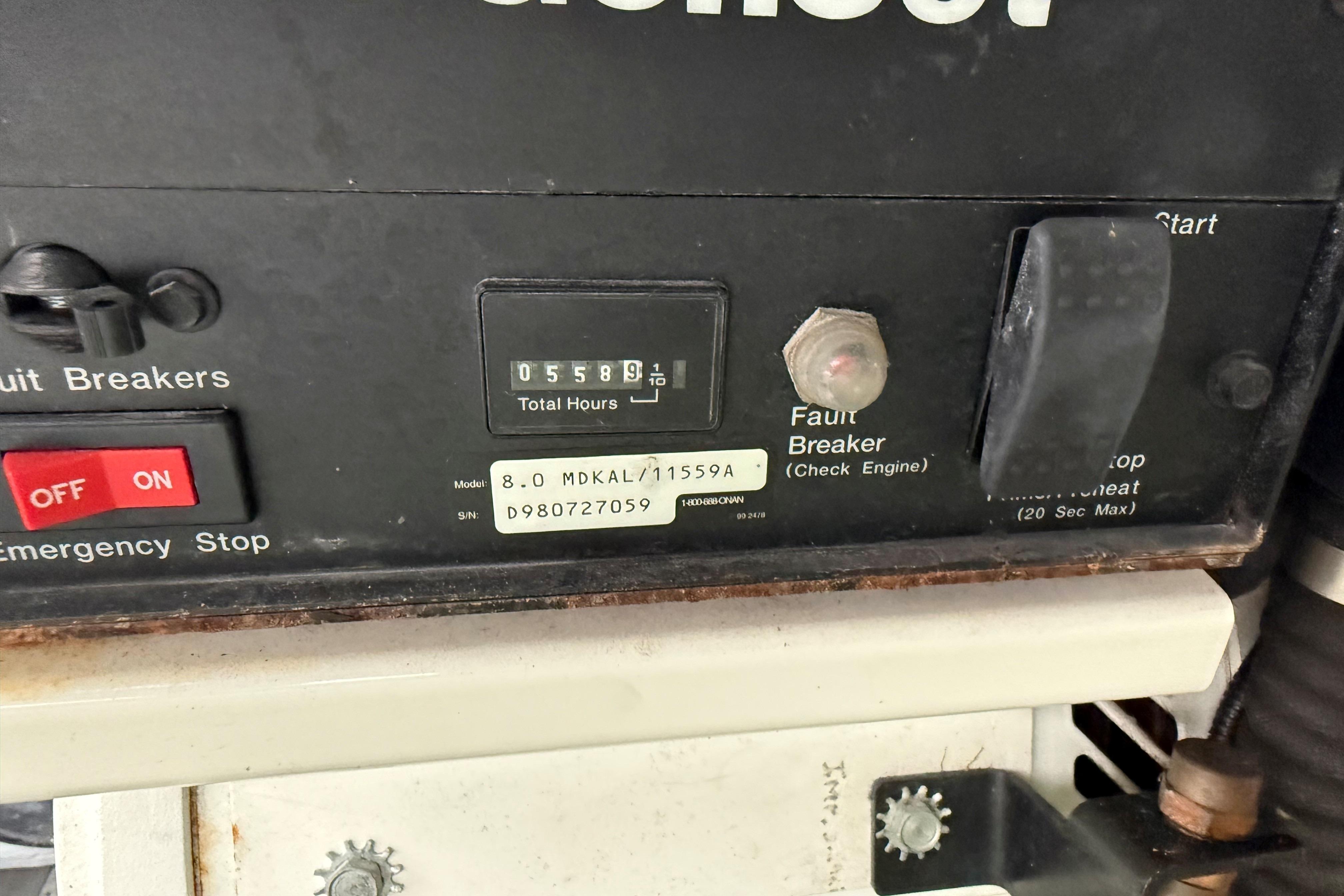 Control panel of a 1999 Mainship 350 Trawler showing 5589.1 total hours.