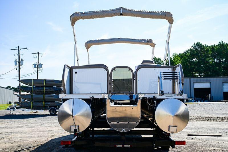 2023 Aloha Pontoon Mahalo 23 boat, rear view, parked outdoors with canopy.
