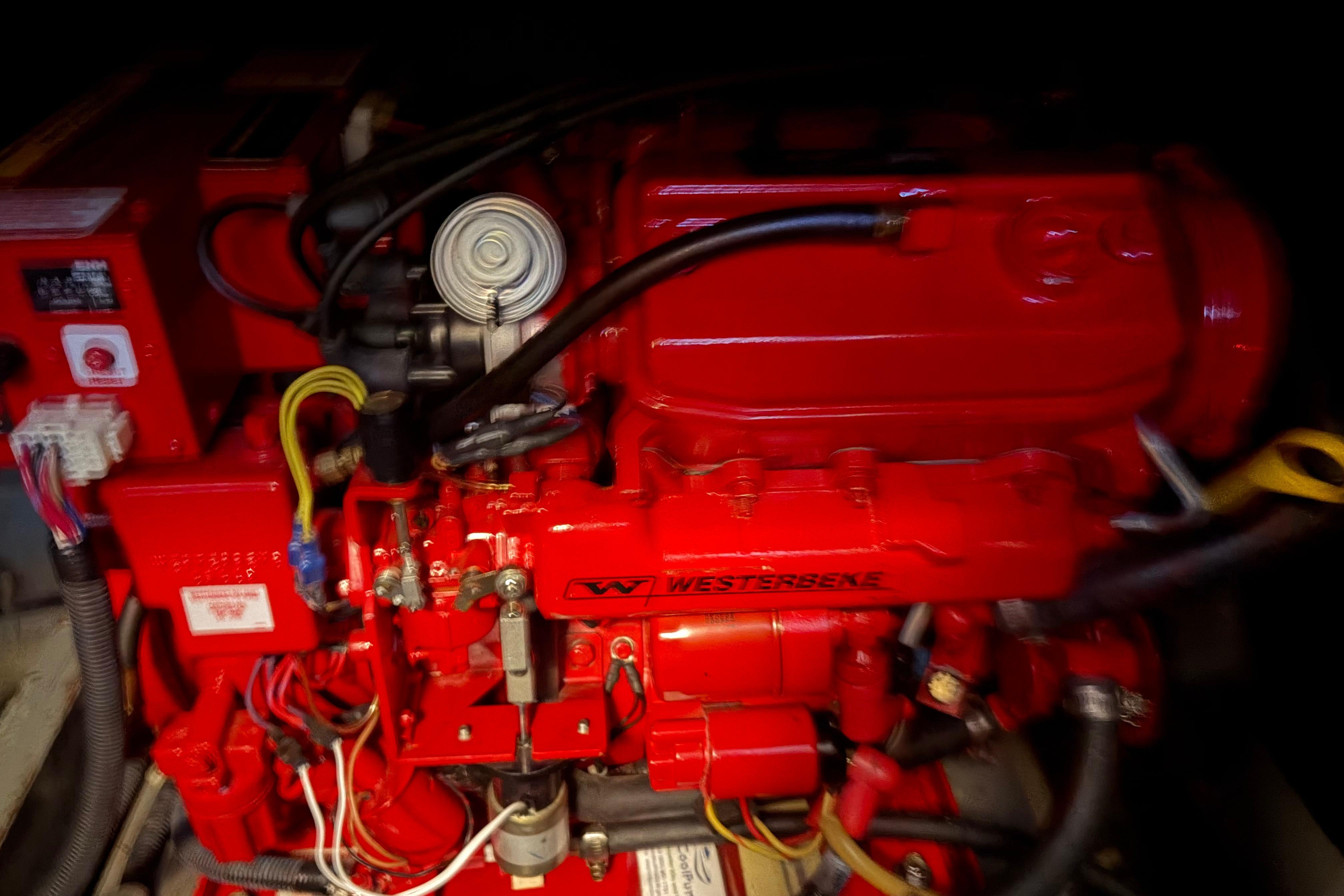 Red Westerbeke engine in a 1971 Chris-Craft 42 Commander boat.