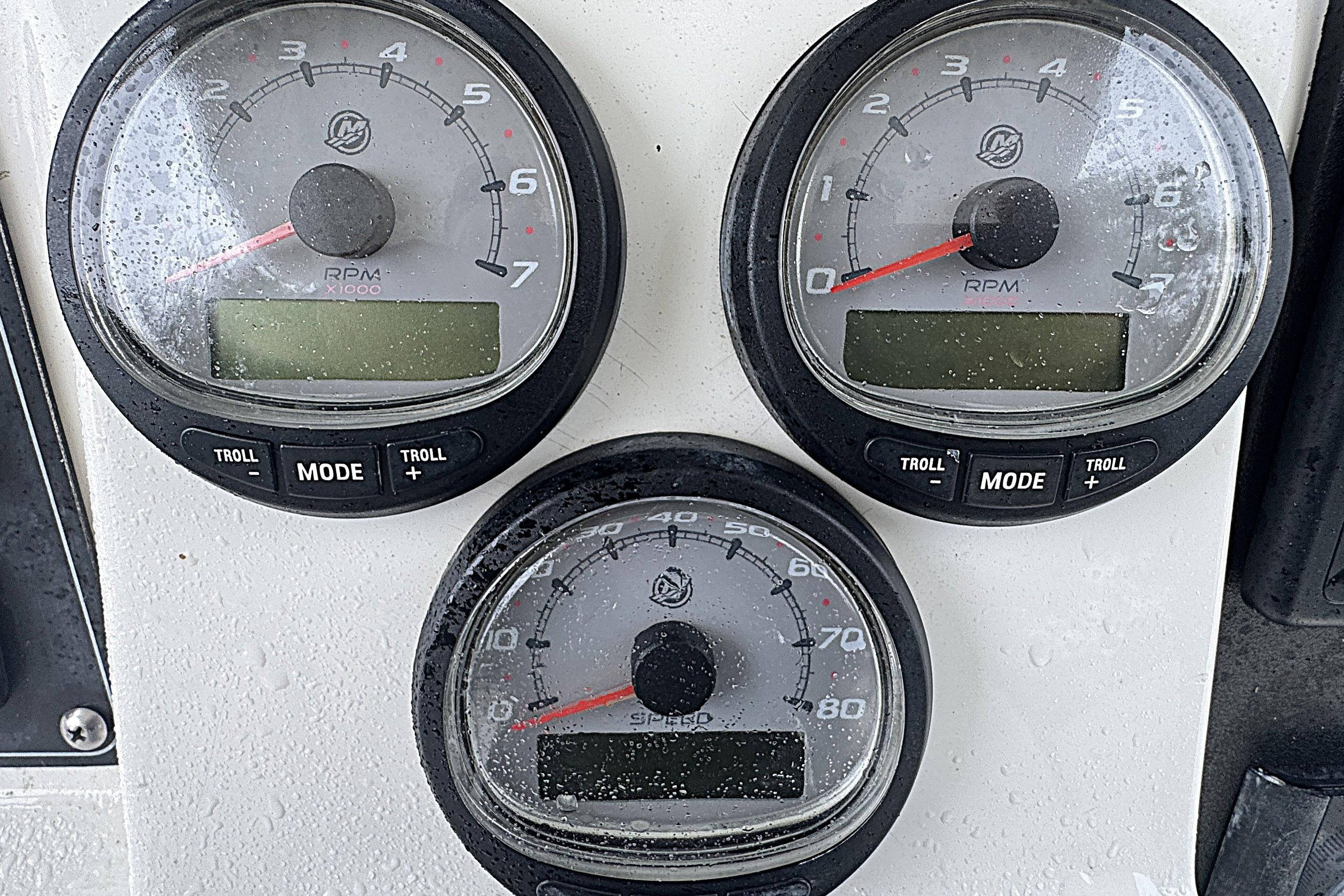 Dashboard gauges of a 2014 Boston Whaler 250 Outrage boat.