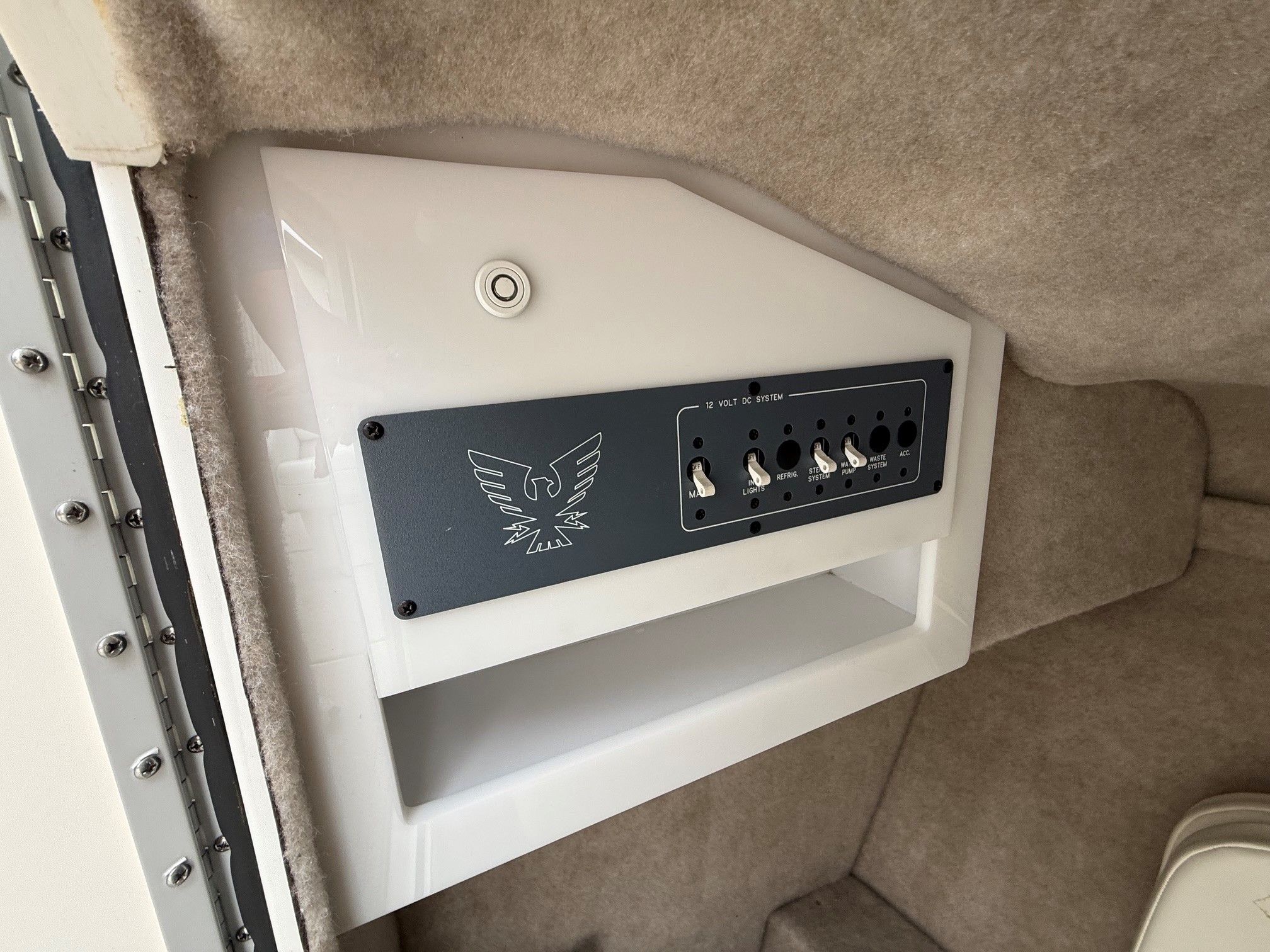 Interior view of a 1998 Formula Thunderbird boat with control panel.