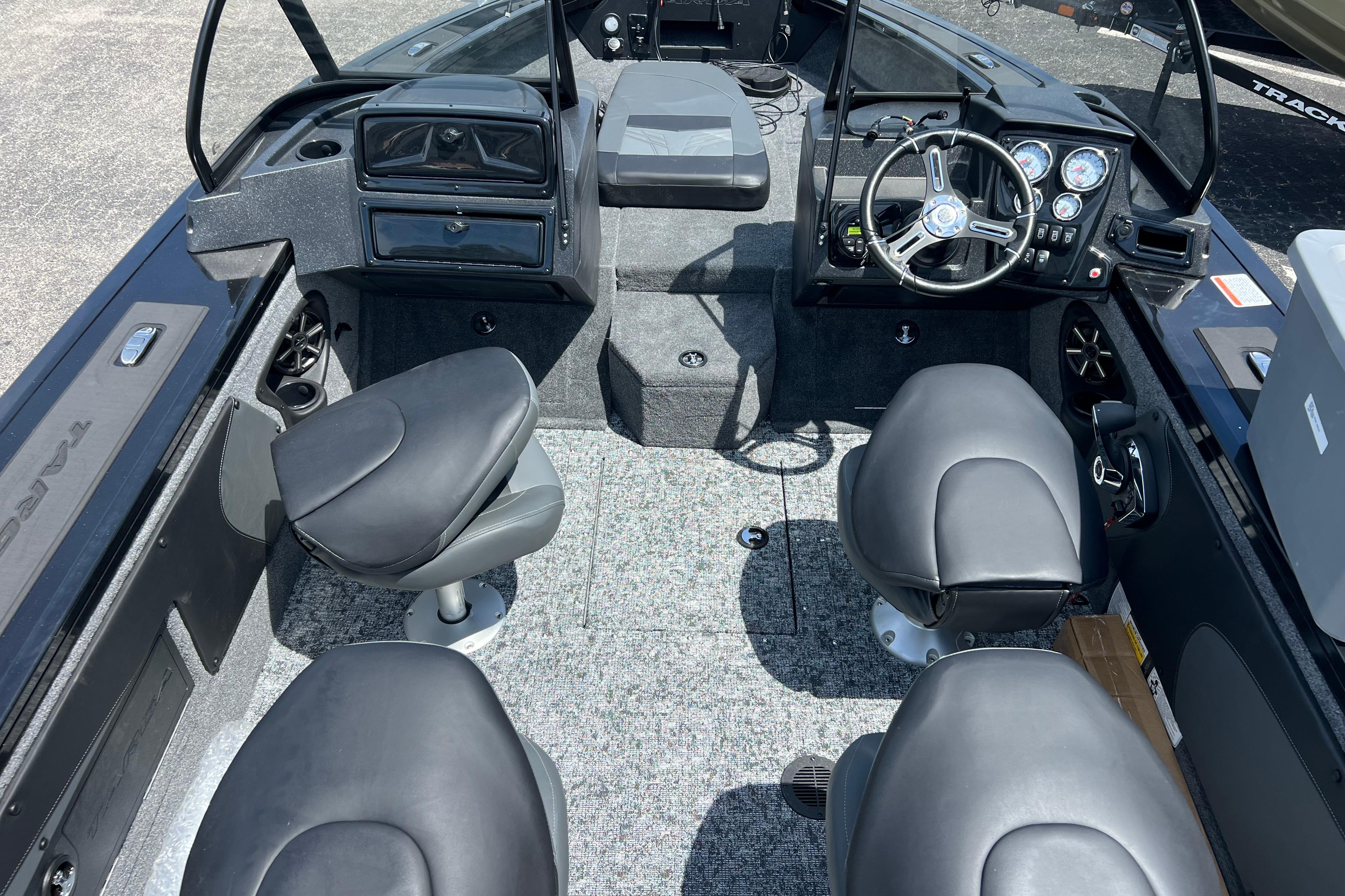 Interior of 2026 Tracker Targa V-19 Combo boat with four seats and steering console.
