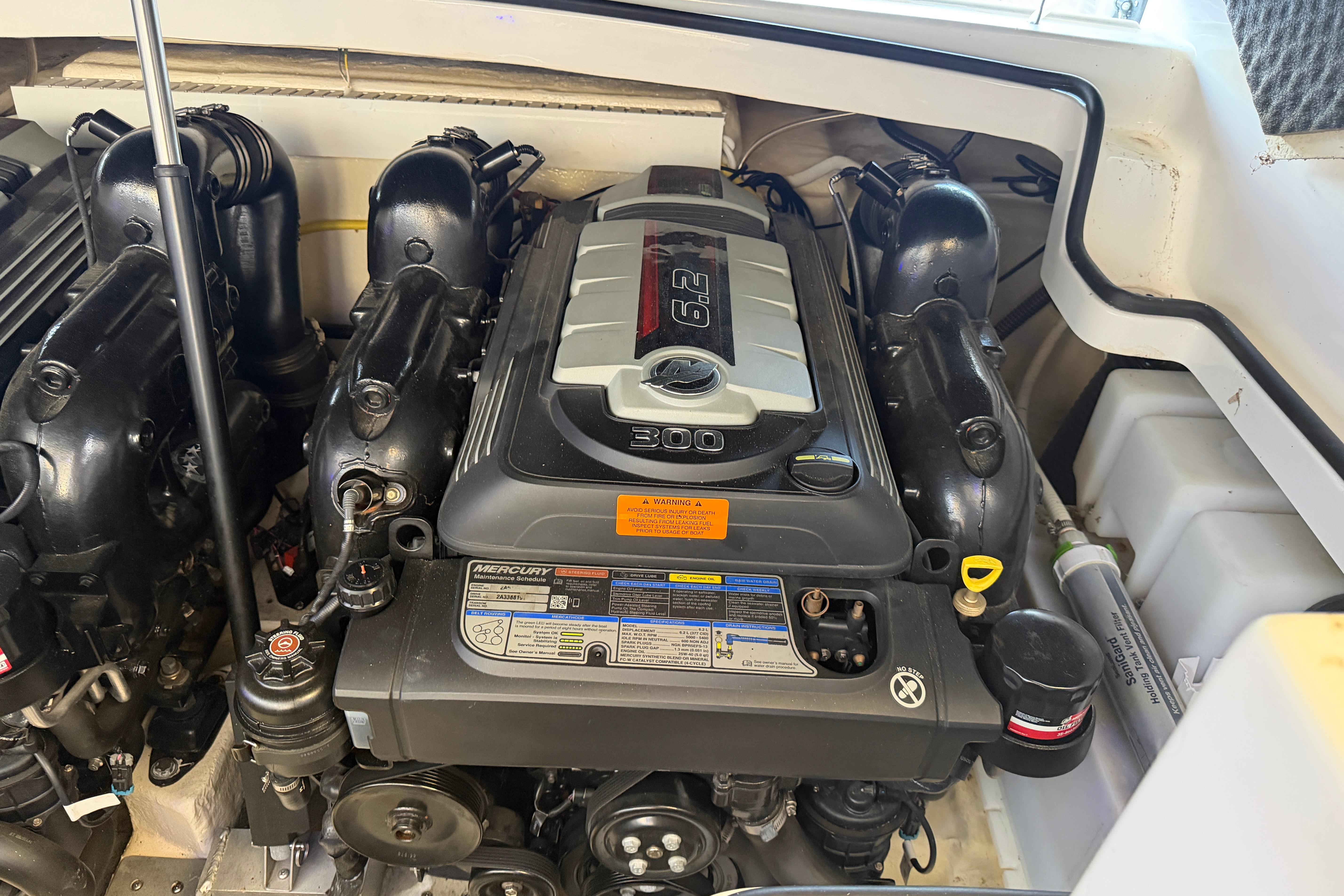 Engine compartment of a 2018 Chaparral 347 SSX boat, featuring a Mercury 6.2L engine.