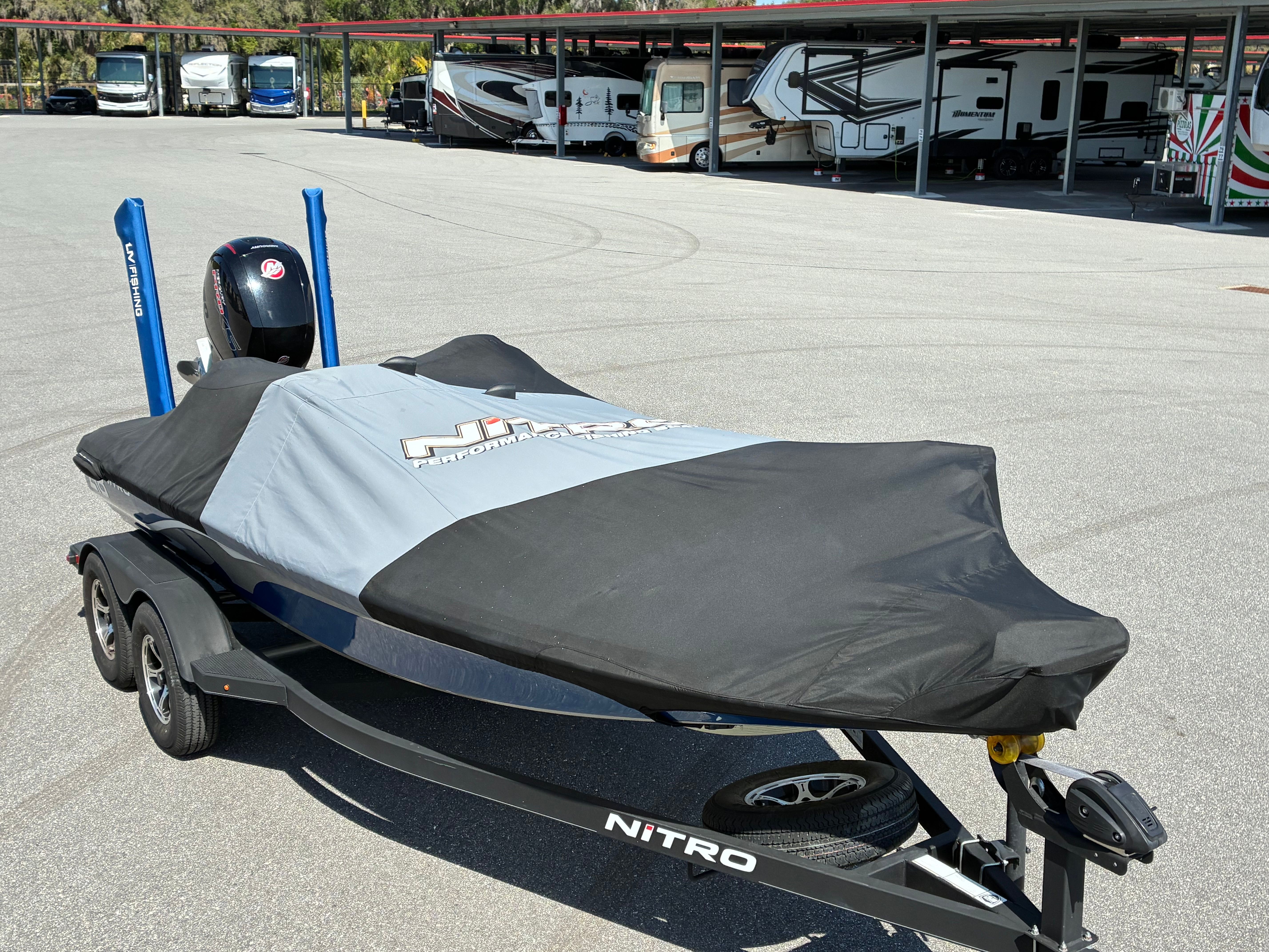 2024 Nitro Z18 Pro boat with cover on trailer.