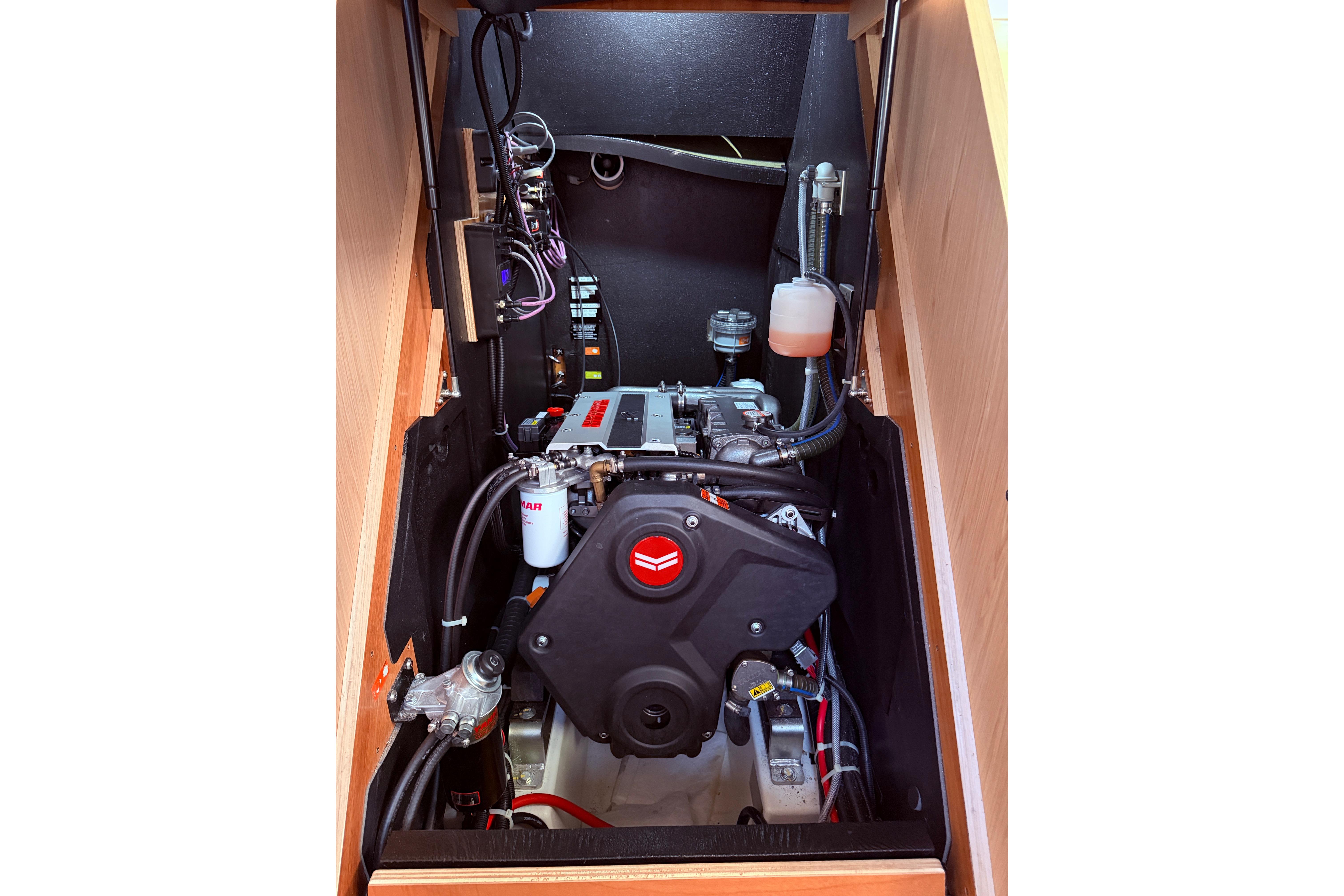 Engine compartment of 2022 Beneteau Oceanis Yacht 54, showcasing modern marine engineering.