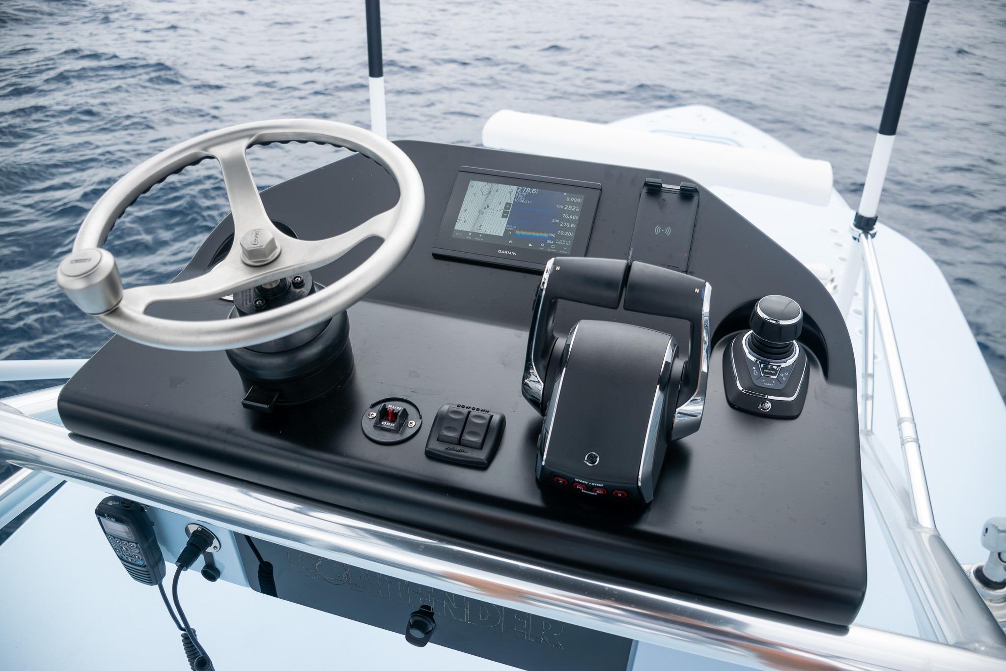Contender 44 ST 2026 helm console on open sea.