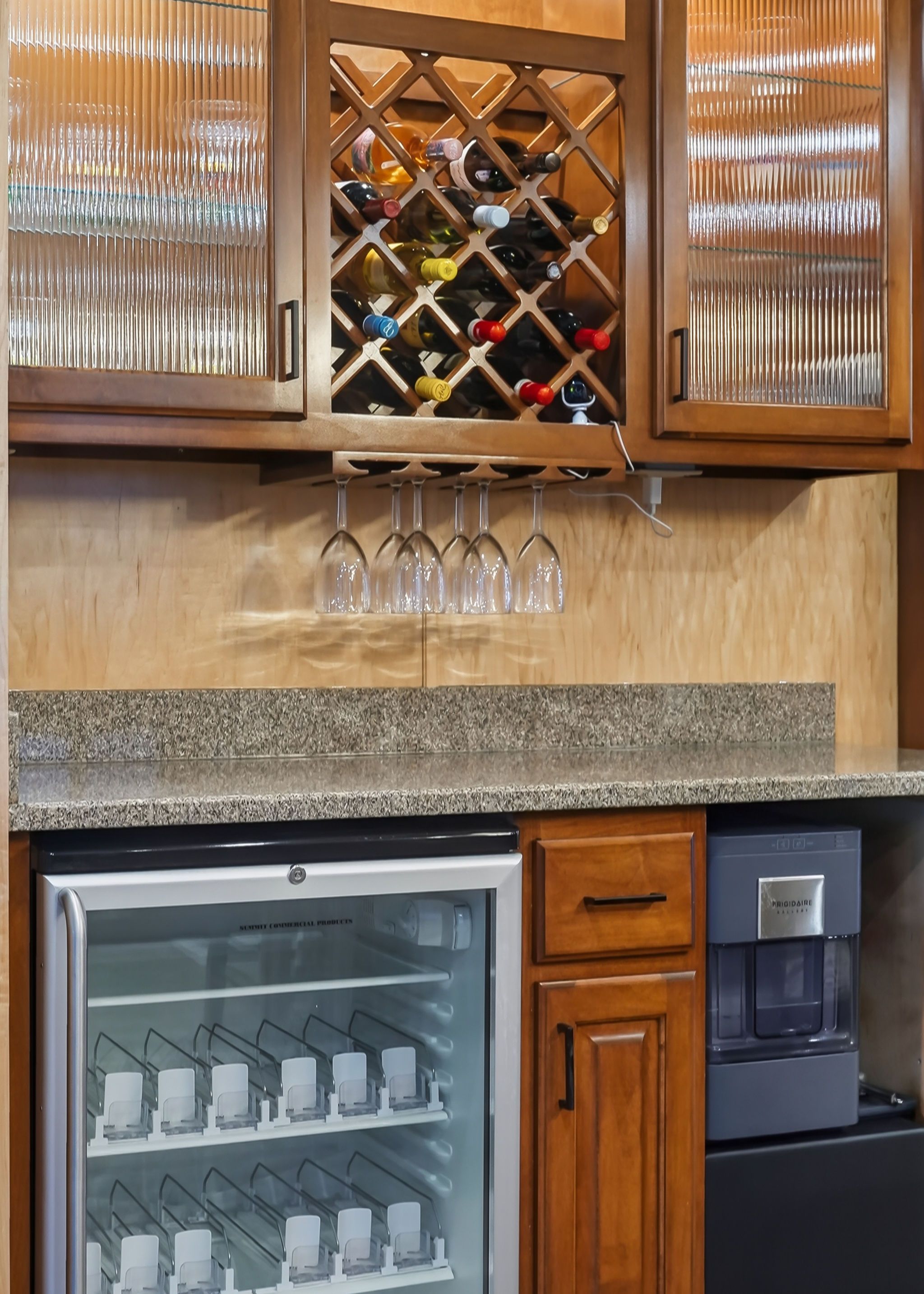 Houseboat kitchen with wine cooler and glasses, 2010 model.