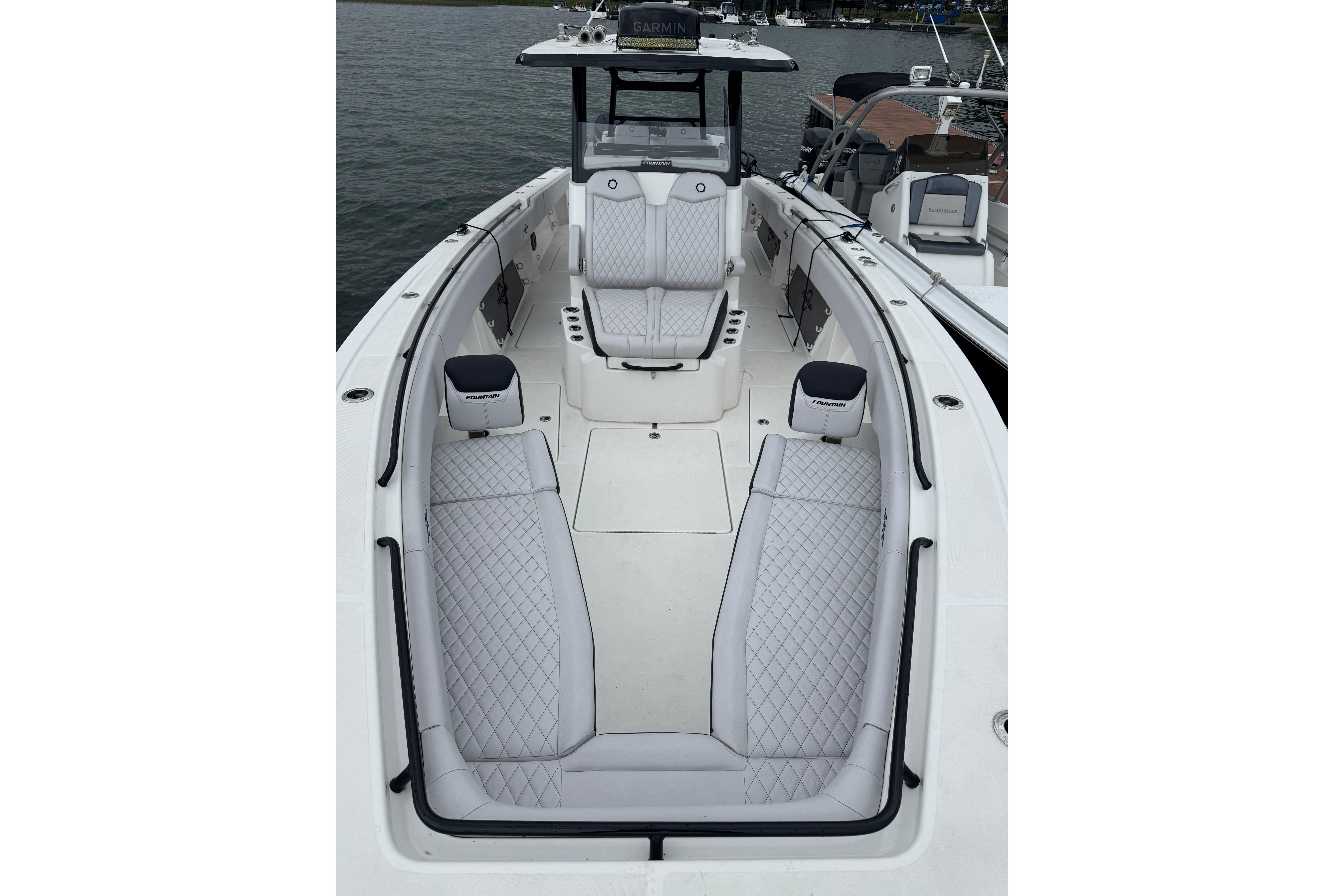 2023 Fountain 38 CC Tournament Edition boat with luxurious seating and sleek design.