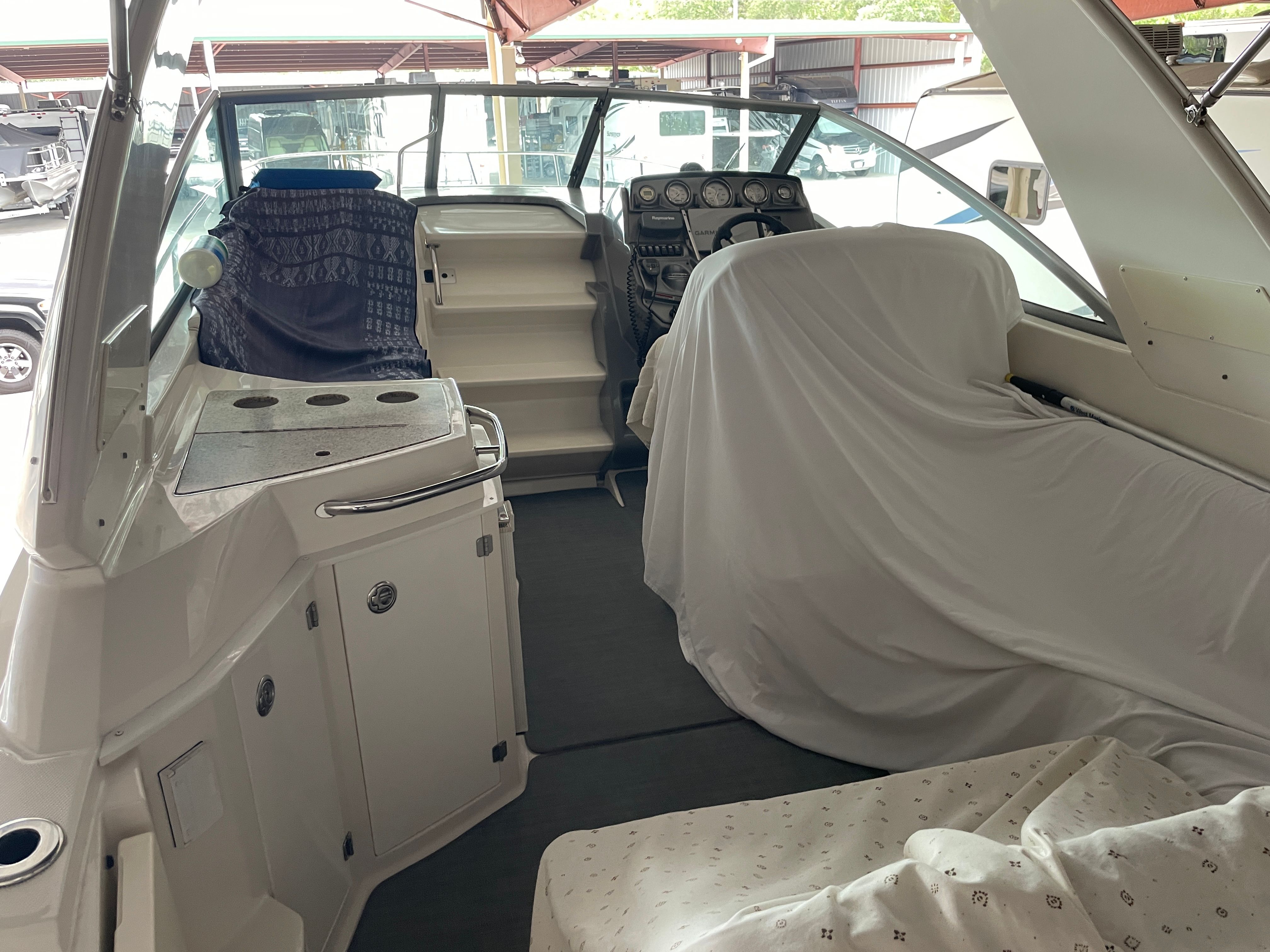 Interior of a 2010 Monterey 280 Sport Cruiser with covers.