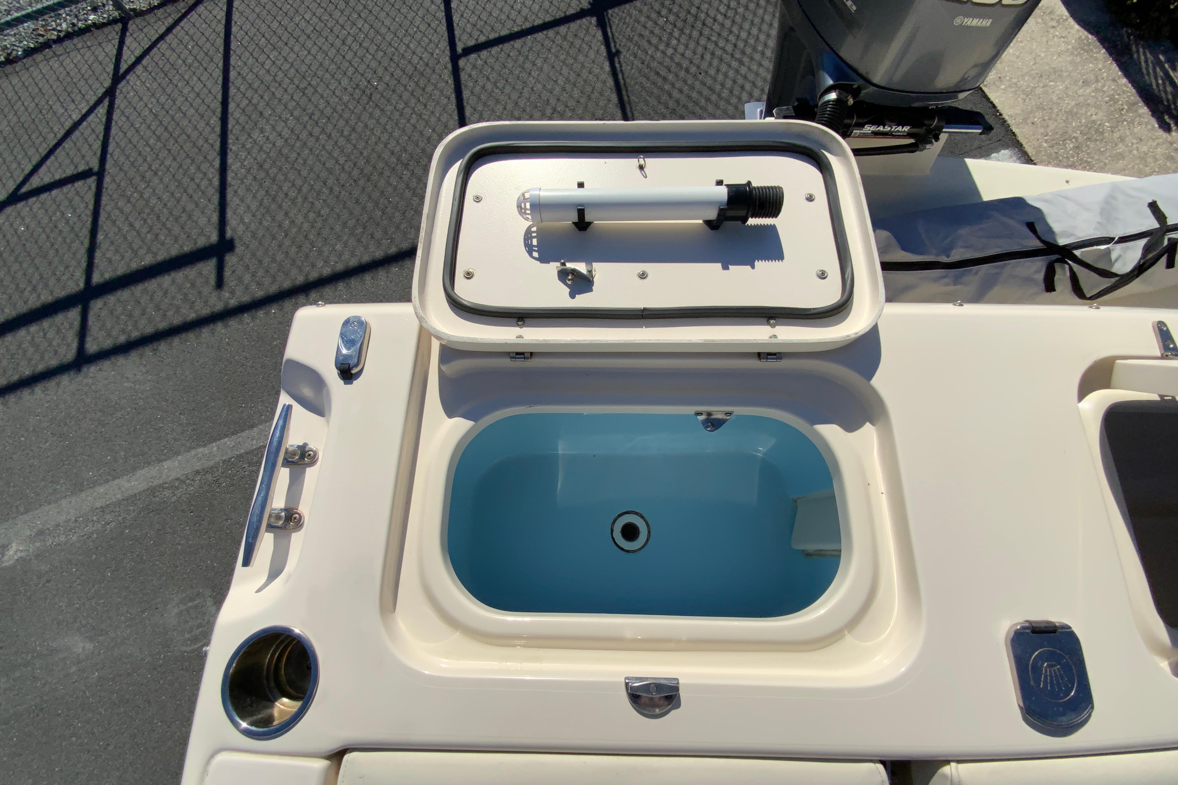 2014 Grady-White Freedom 225 boat with open livewell and Yamaha engine.