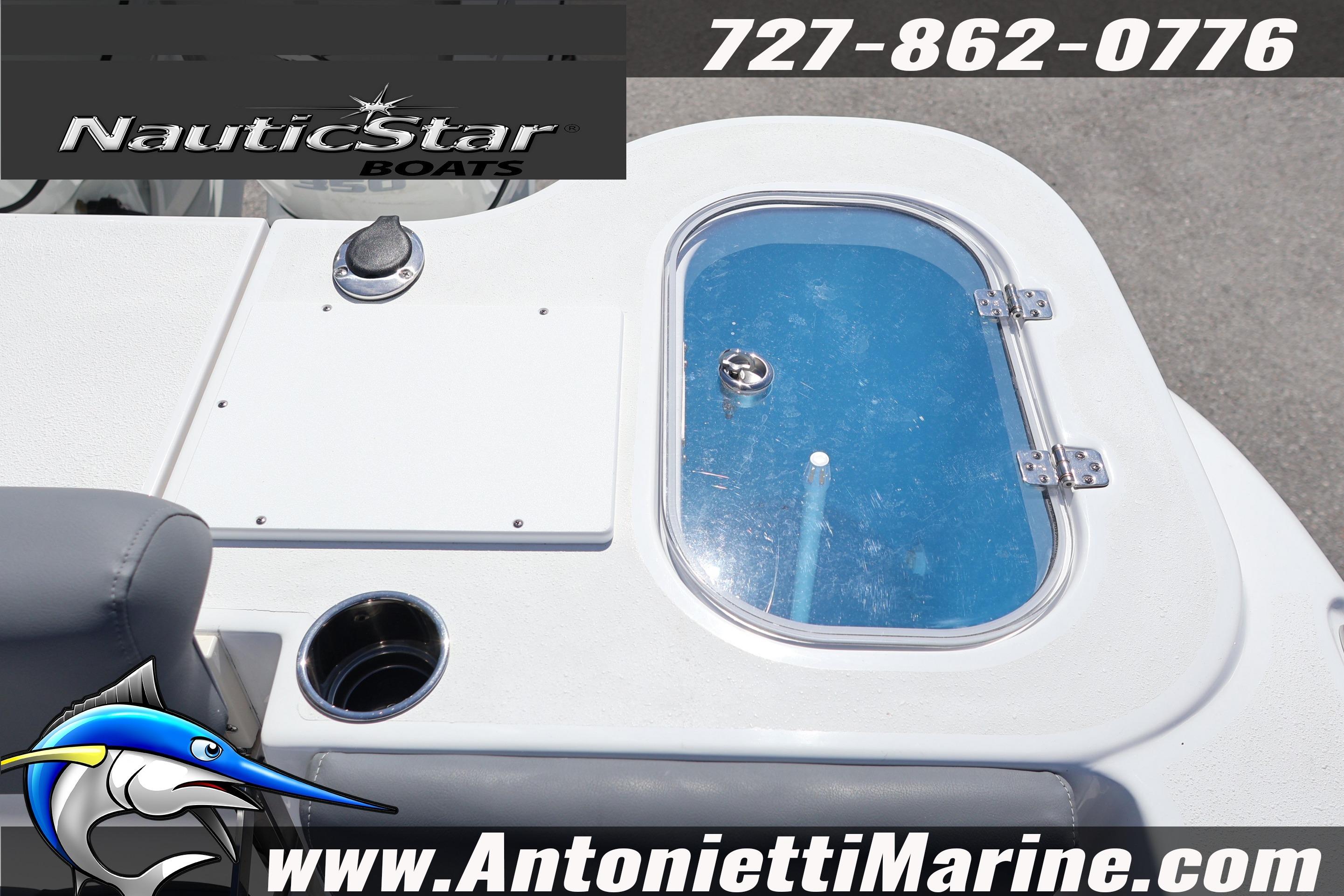 2026 NauticStar 292 Legacy boat detail with contact info and website.