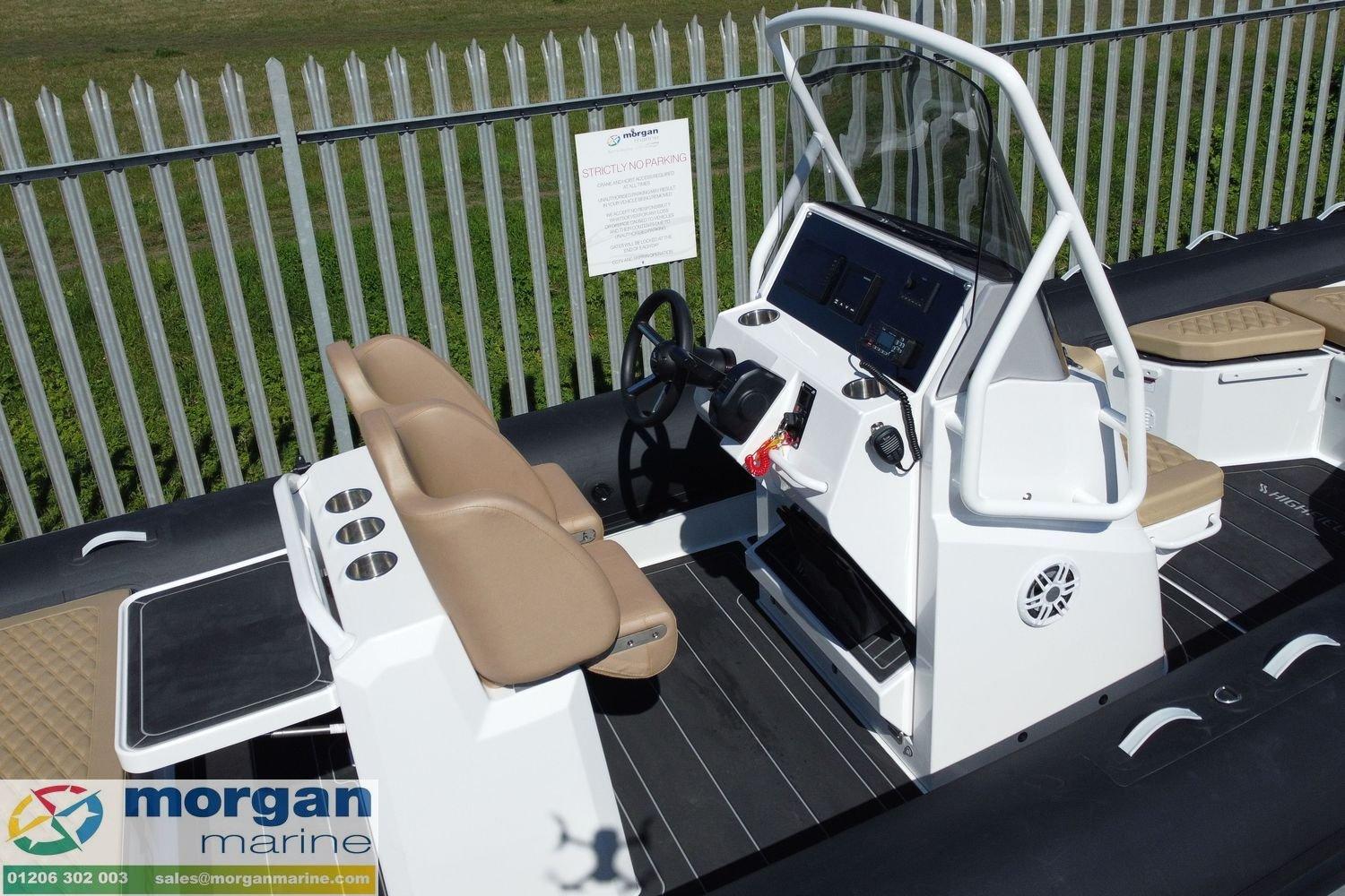 2023 Highfield SP 700 boat interior with steering console and seating, displayed at Morgan Marine.