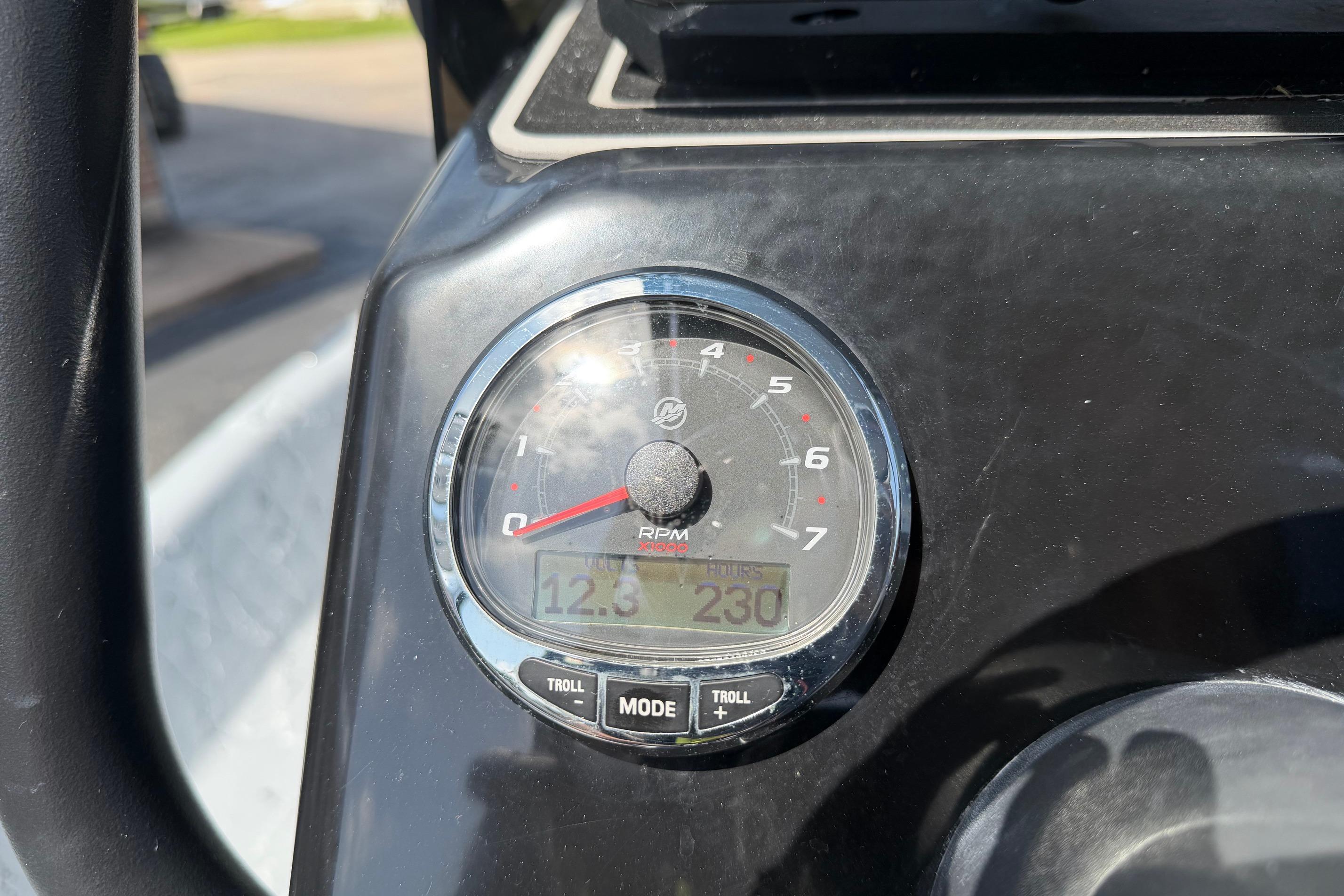 Close-up of a 2023 Haynie 23 Super Cat tachometer displaying RPM and hours.