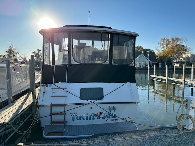 1988 Carver 3807 Yacht docked at sunset.