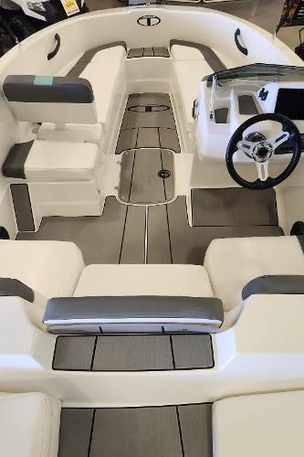 2025 Tahoe T16 boat interior with modern seating and steering wheel design.