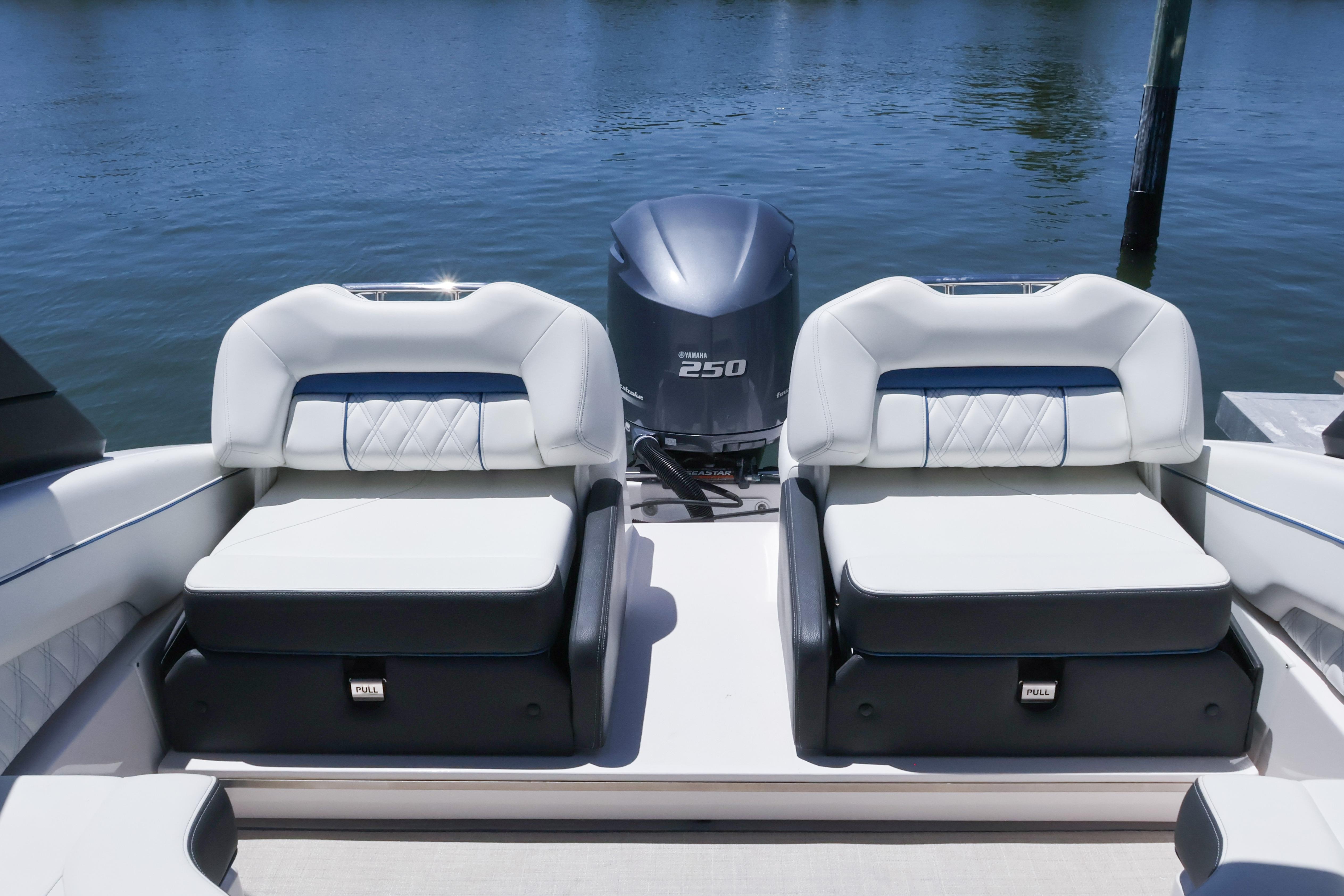 2020 Regal LX4 boat with dual seating and Yamaha 250 engine on calm water.