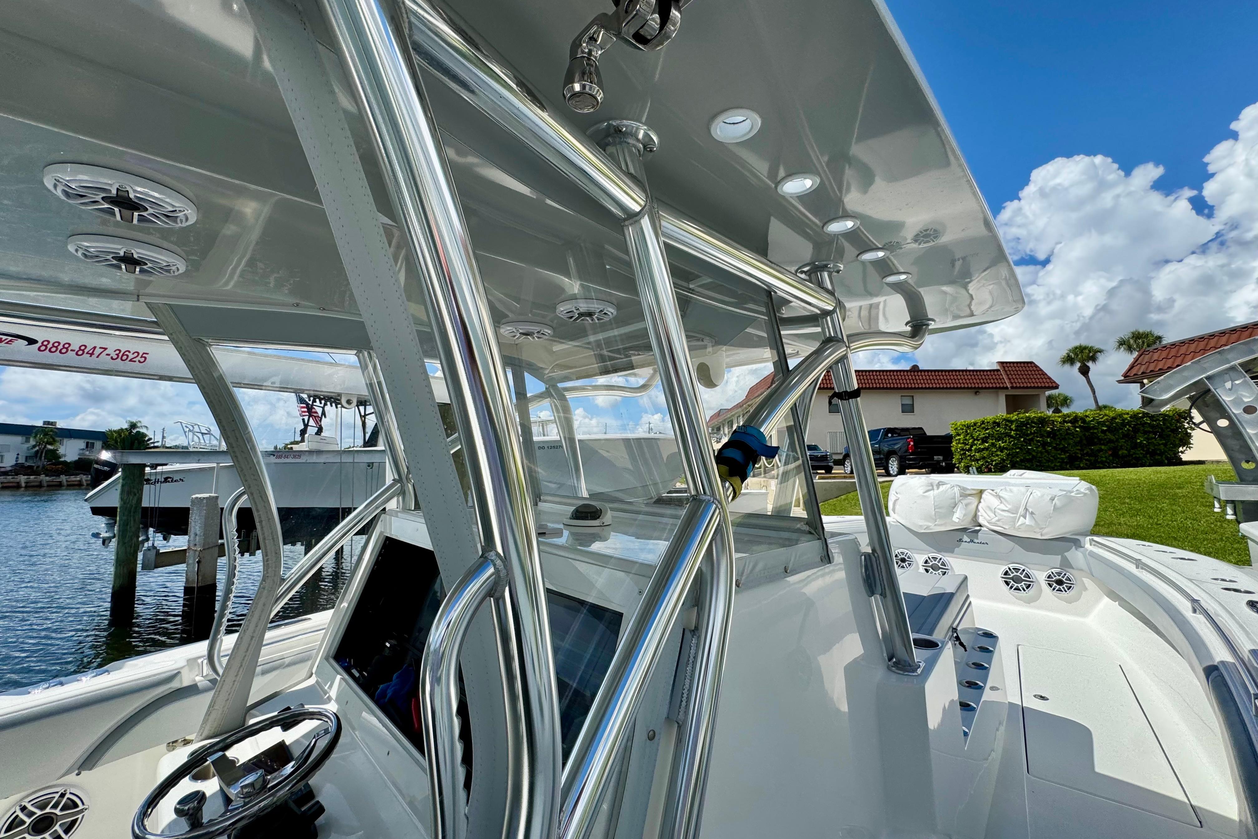 2021 SeaHunter 41 CTS boat interior with sleek design and modern features, docked by the water.