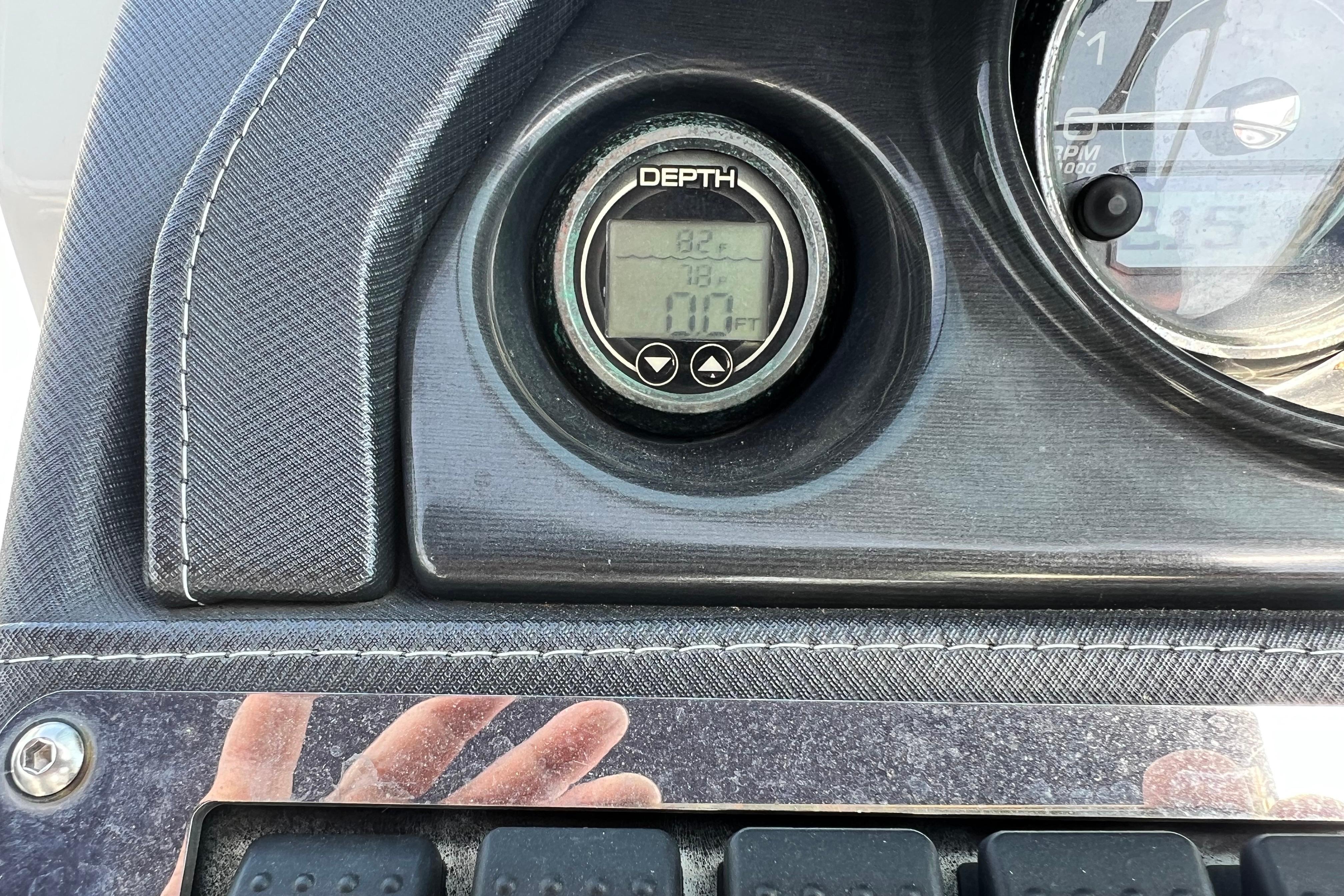 Dashboard of a 2015 Monterey 268SS Super Sport boat with depth gauge display.
