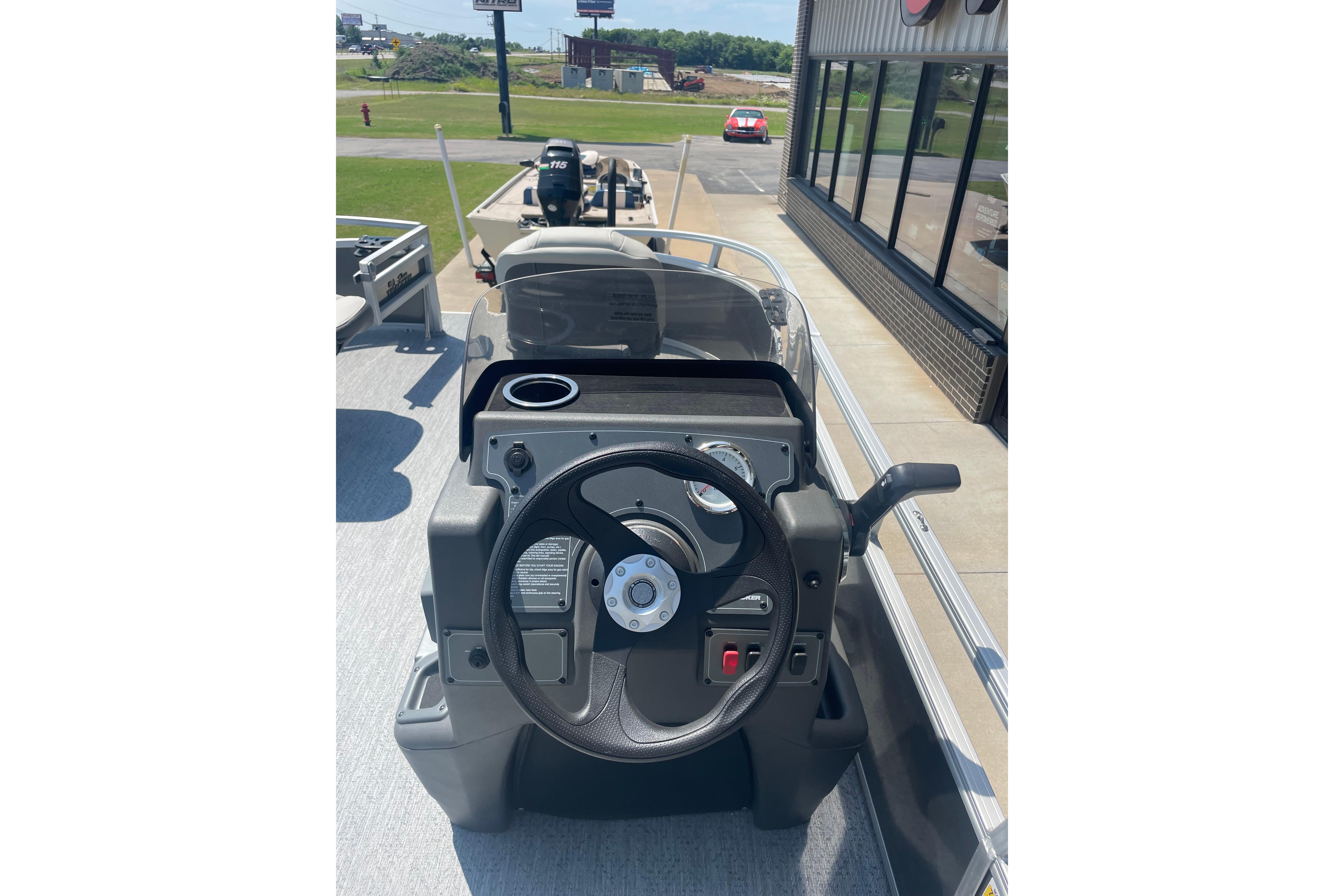 2026 Sun Tracker Bass Buggy 16 XL Select steering console with controls and gauges.