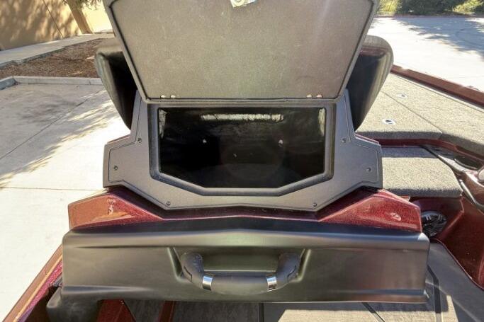 2026 Nitro Z21 XL Pro boat storage compartment with open lid, showcasing interior space.