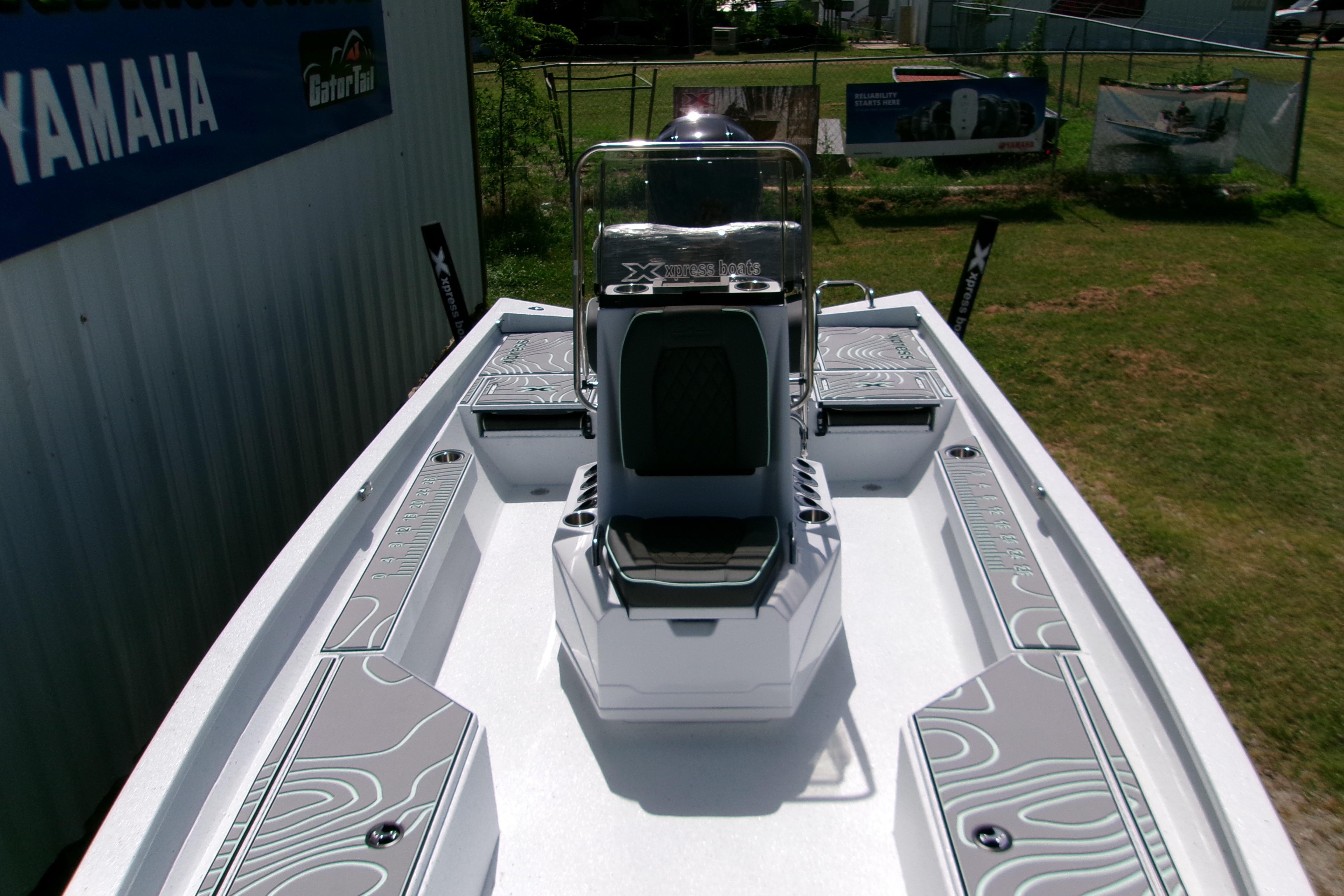 2027 Xpress H22B Bay boat interior with sleek design and modern seating.