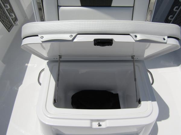 2024 Wellcraft 352 Fisherman boat storage compartment with open lid.