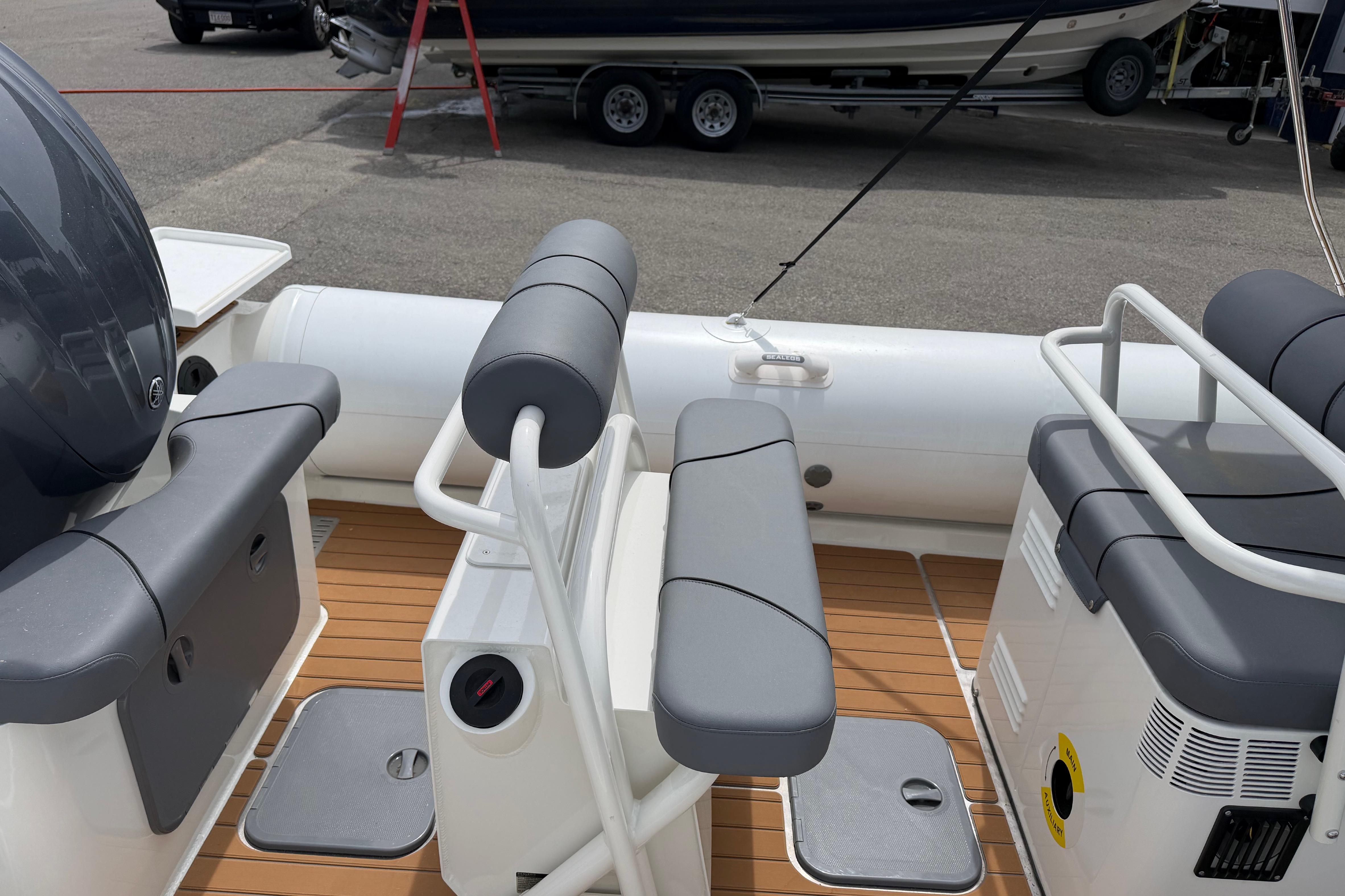 2024 Sealegs 7.1m RIB boat interior with seating and control panel.