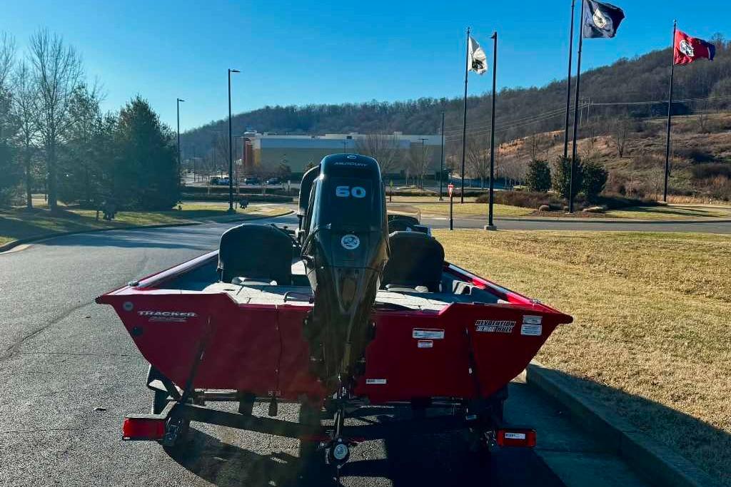 2026 Tracker Pro Team 175 Crappie Edition boat with 60 HP motor in a scenic setting.