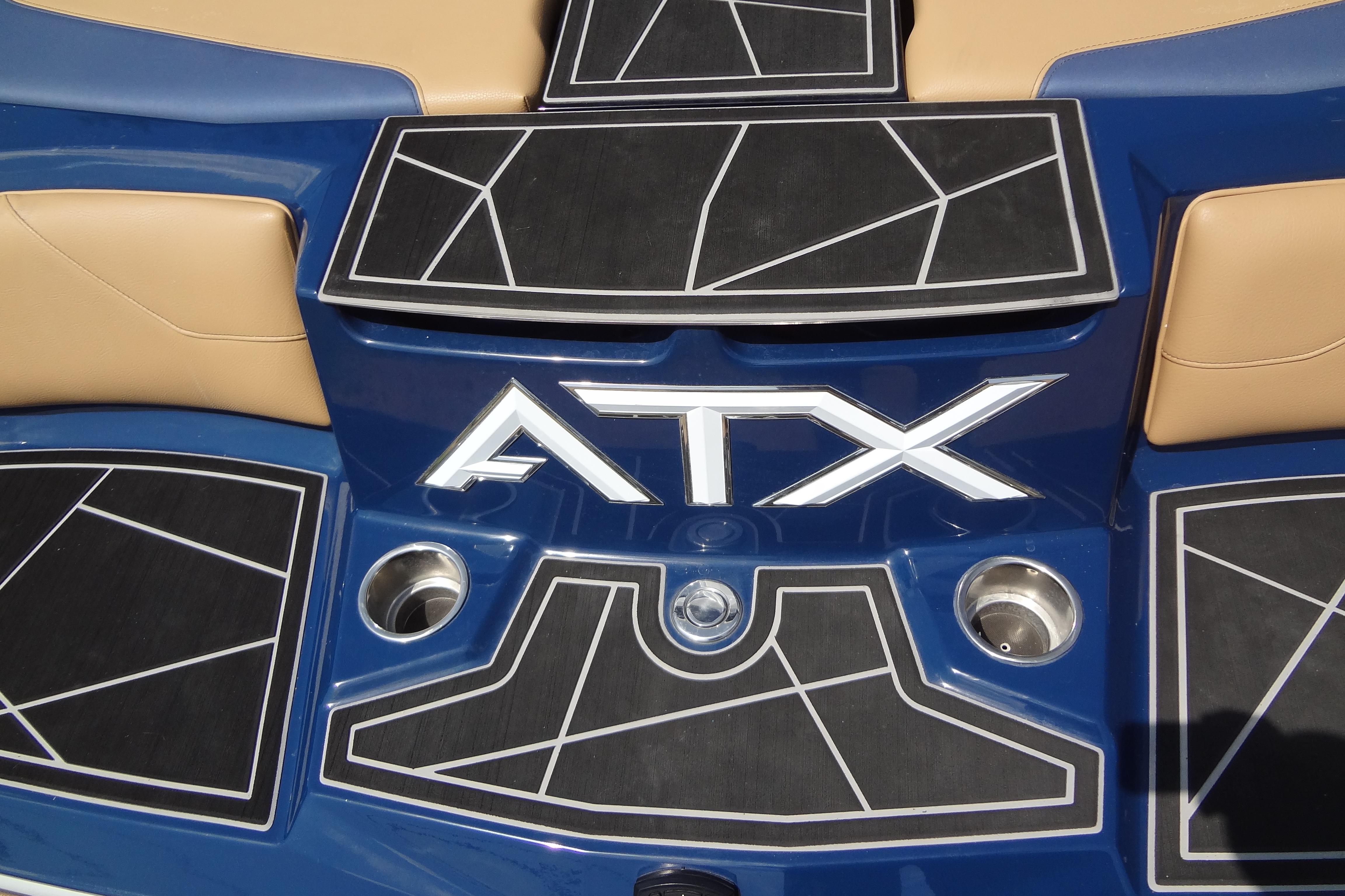2022 ATX Surf Boats 24 Type-S, blue and tan interior with geometric black accents.
