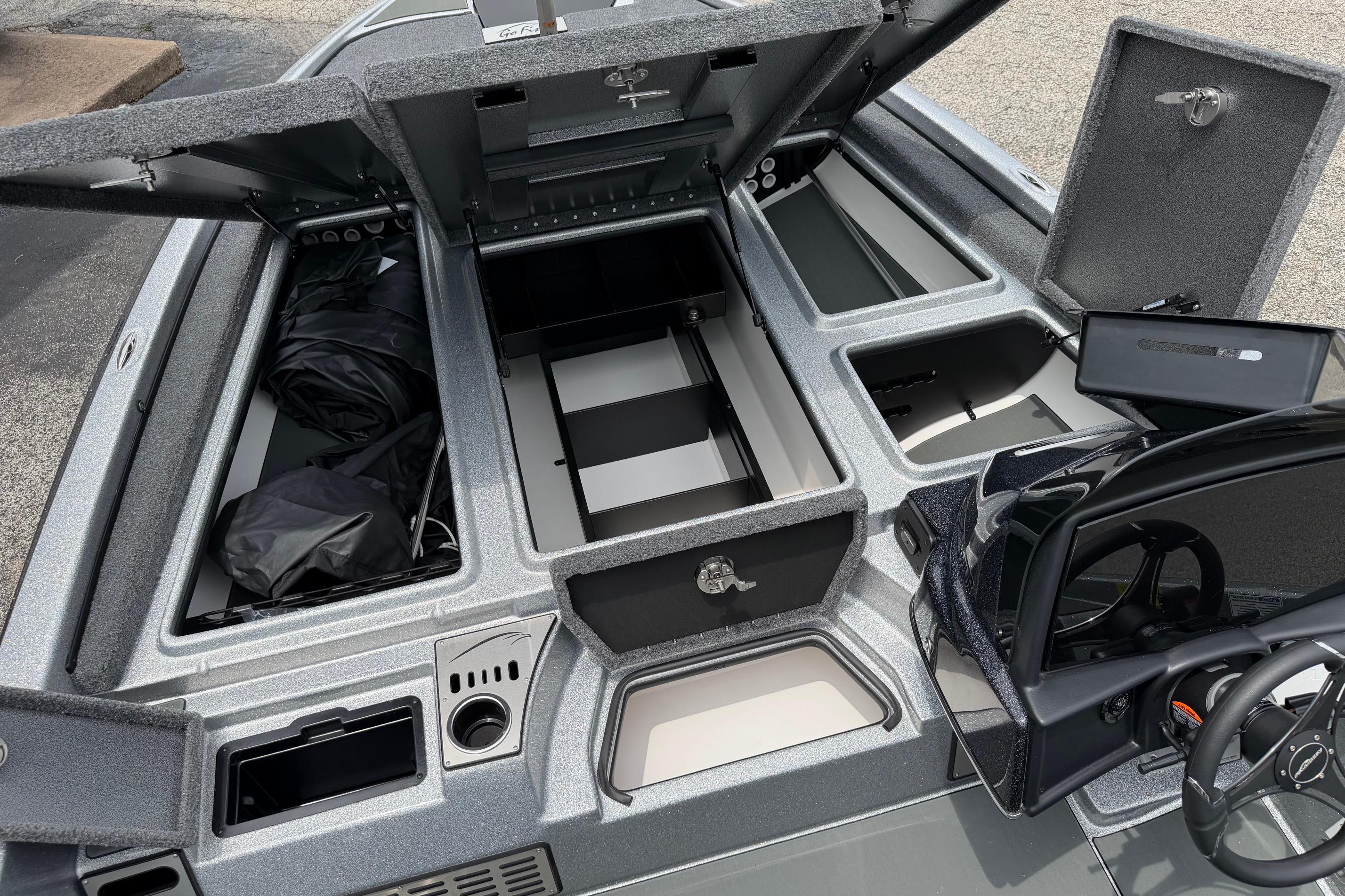 Open storage compartments in a 2027 Falcon F20 PREDATOR boat, showcasing ample space and organization.