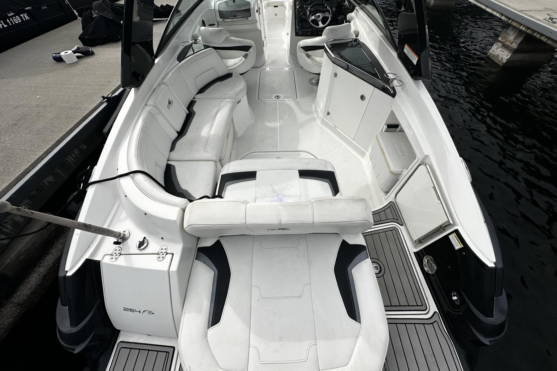 2015 Monterey 264FS boat interior with white seating and sleek design.