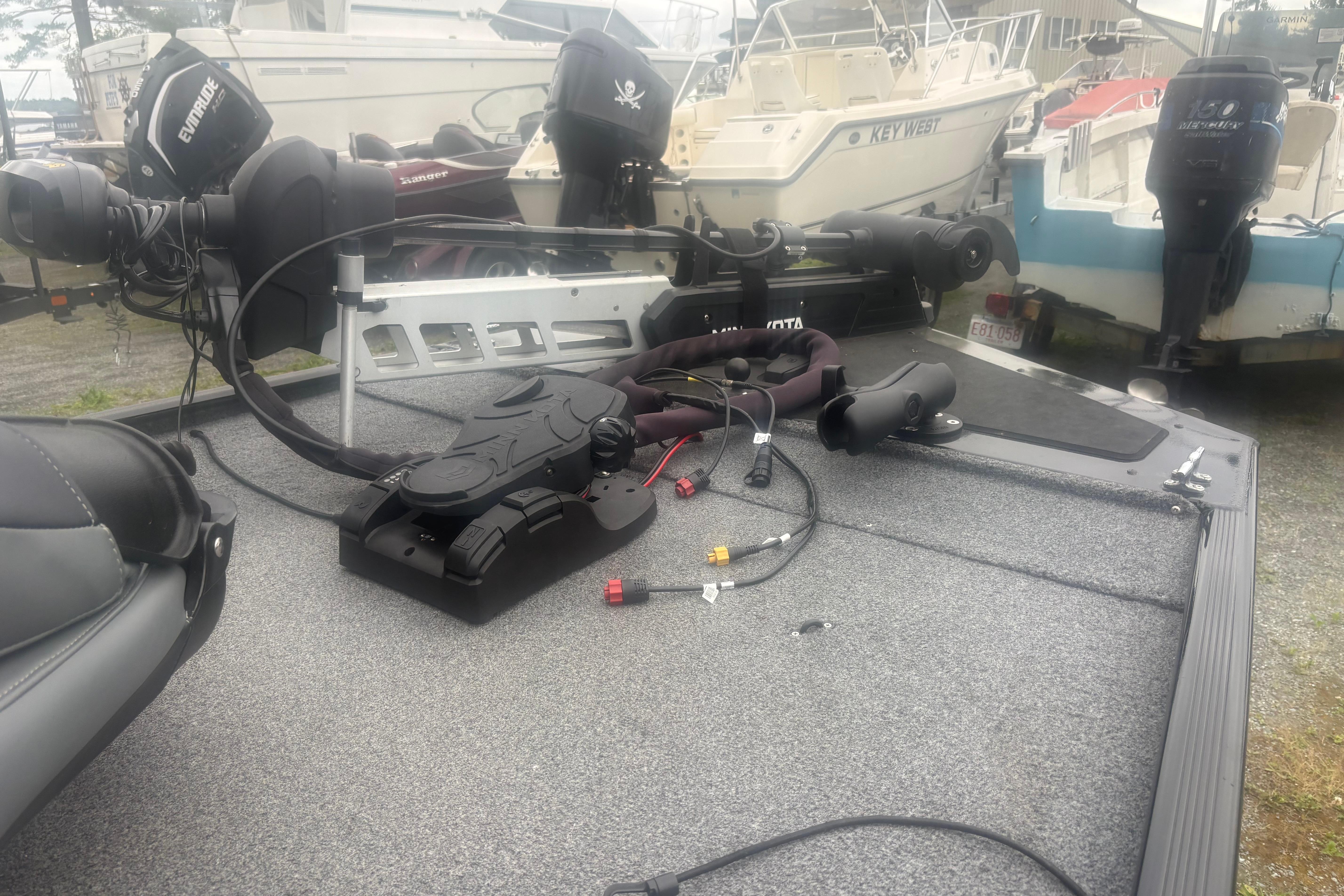 2020 Bass Tracker III Classic boat deck with motor and equipment.