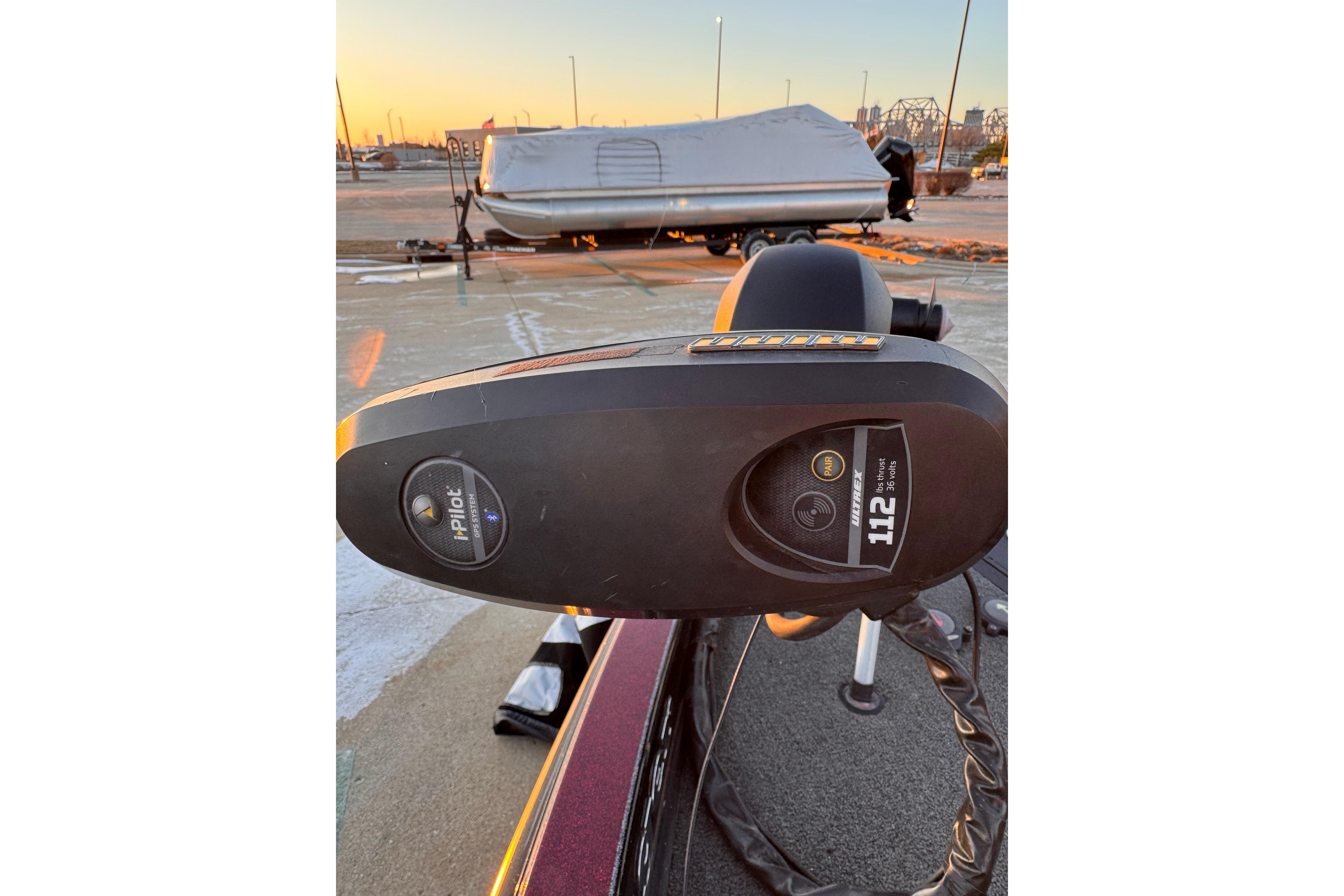 2017 Ranger Z520 Comanche boat with iPilot trolling motor at sunset.