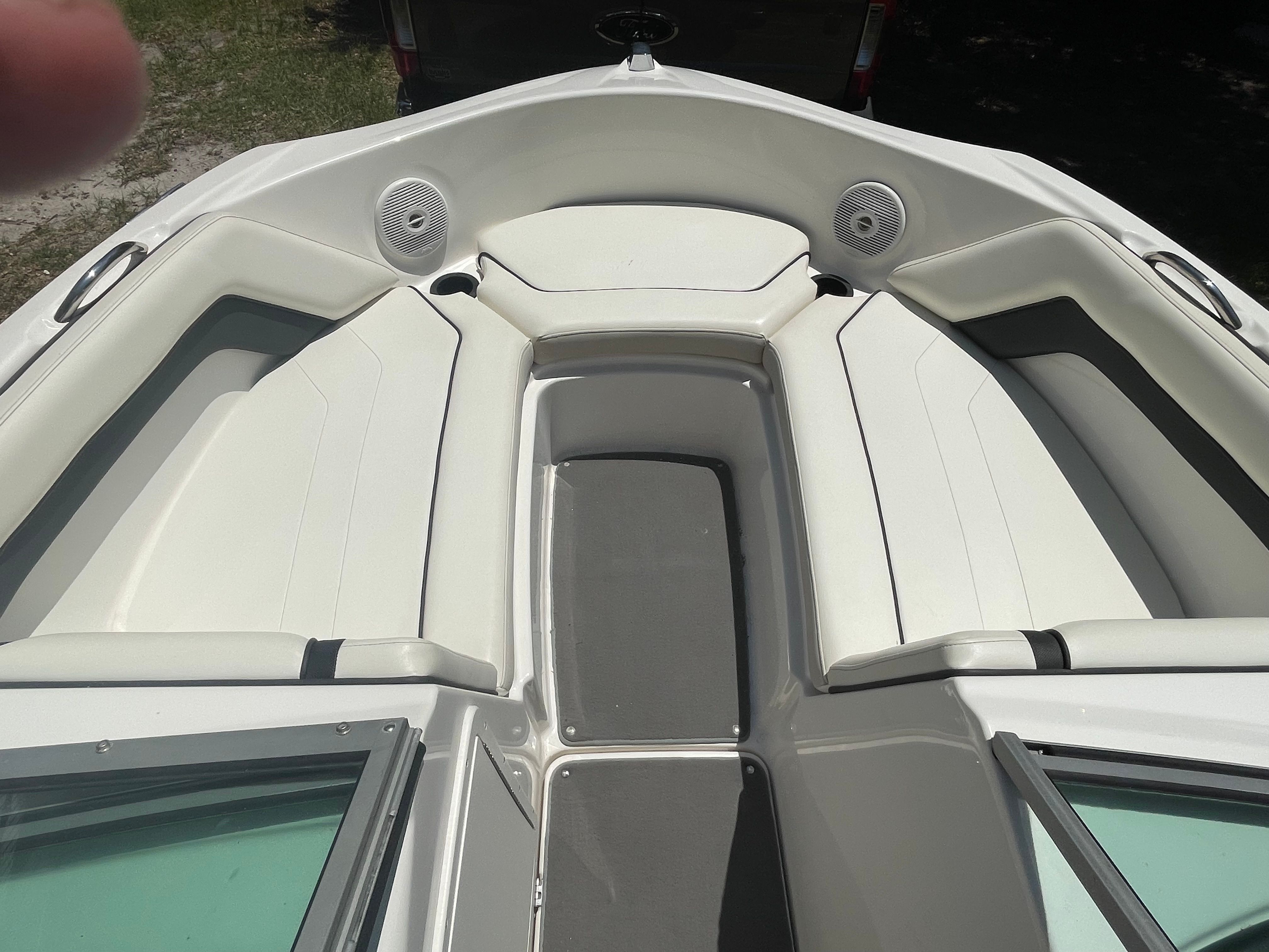 The image shows the bow area of a 2015 Yamaha SX190 boat with white upholstery.