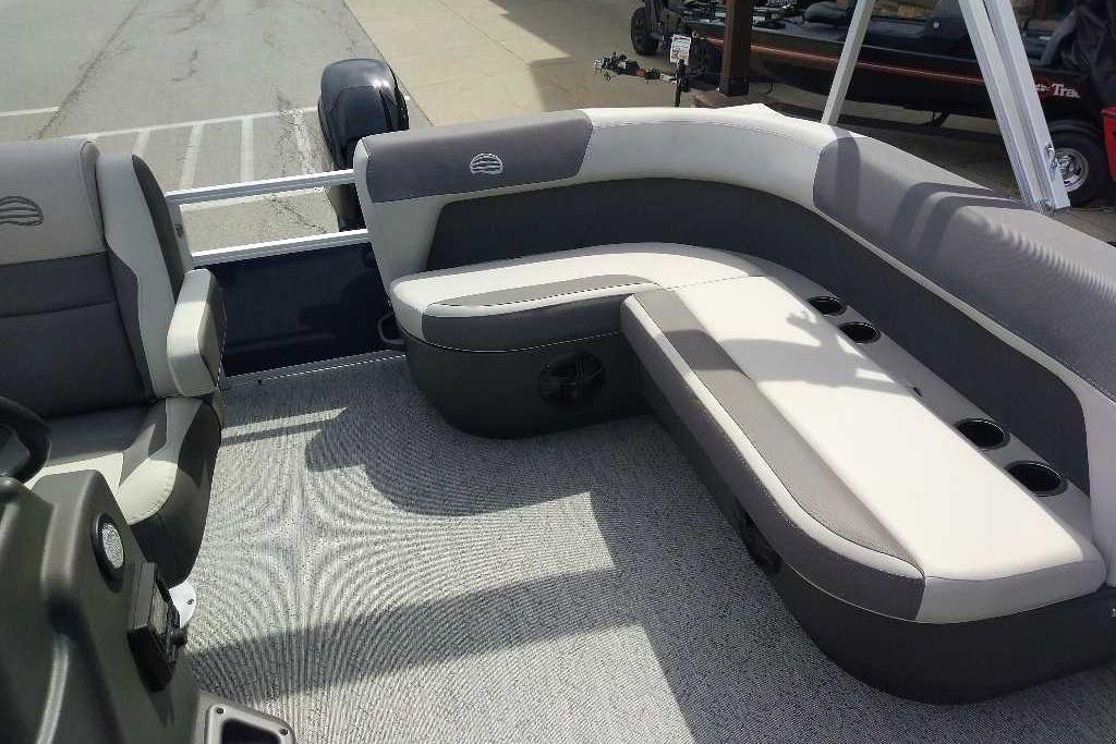 2026 Sun Tracker Bass Buggy 16 XL Select pontoon boat interior with cushioned seating.