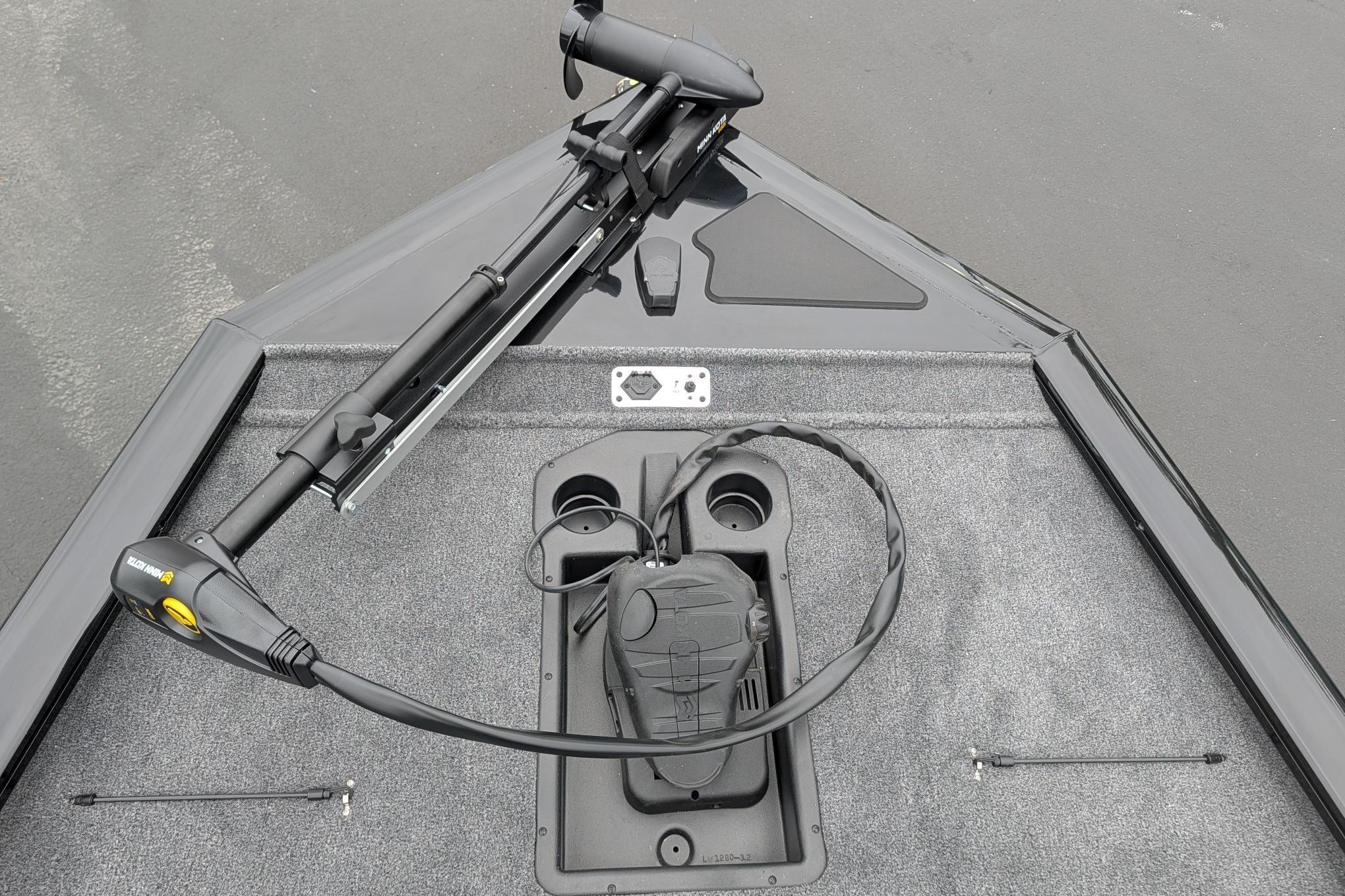 2026 Tracker Pro Team 195 boat deck with trolling motor and foot pedal.
