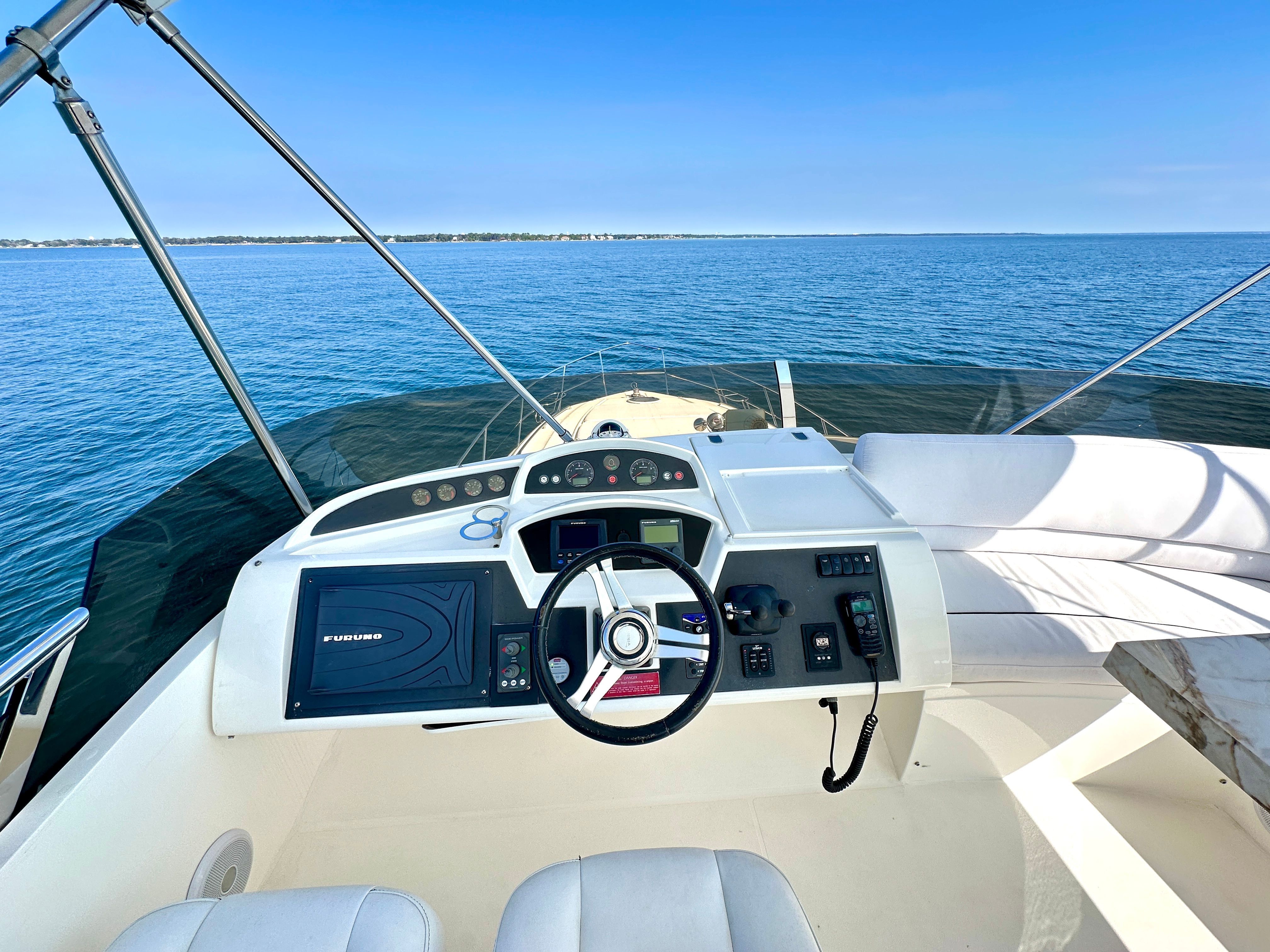 Viking Princess F54 Flybridge 2009 on open sea.