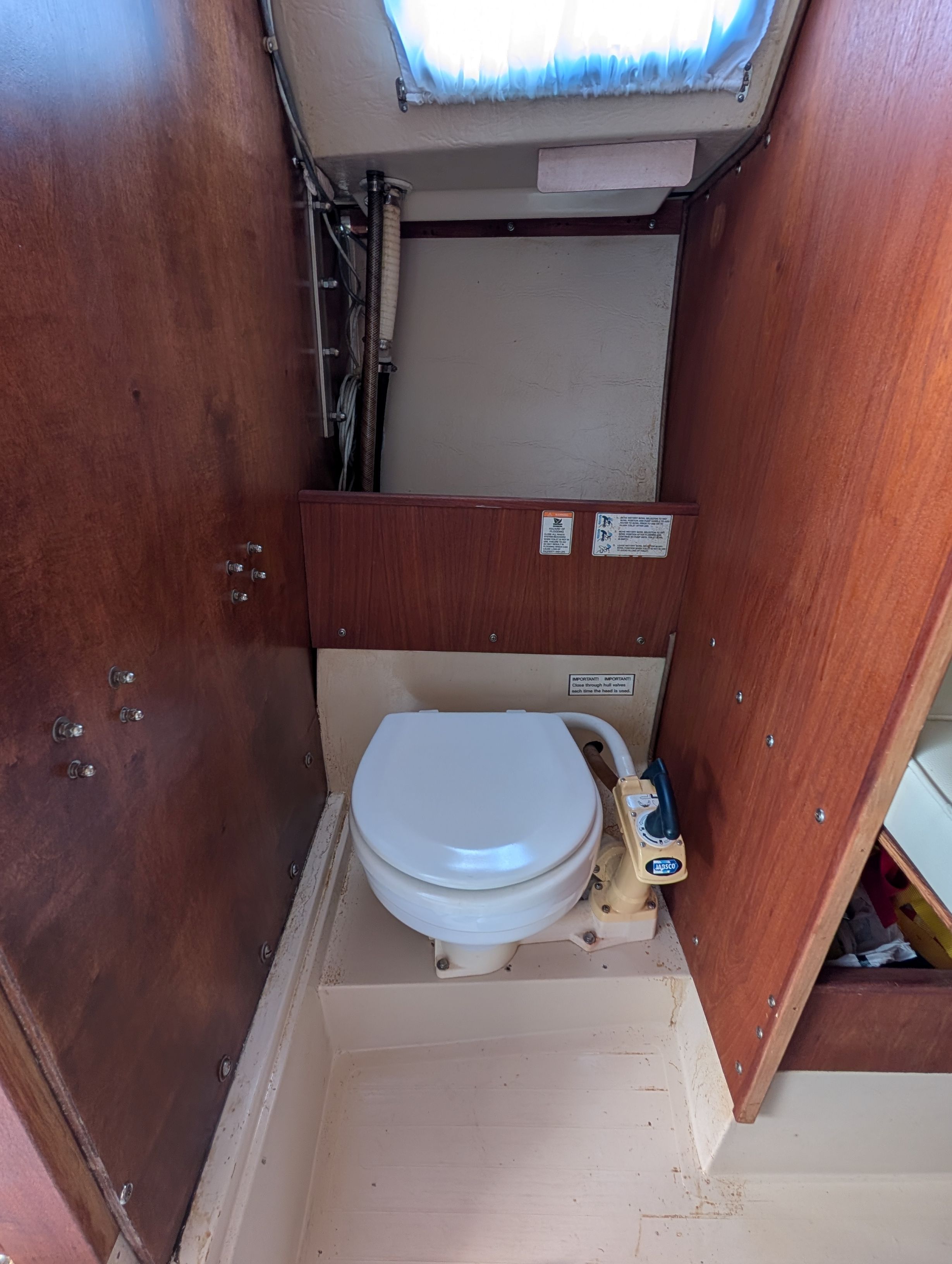 Interior of a 1985 Catalina 25 yacht with toilet.