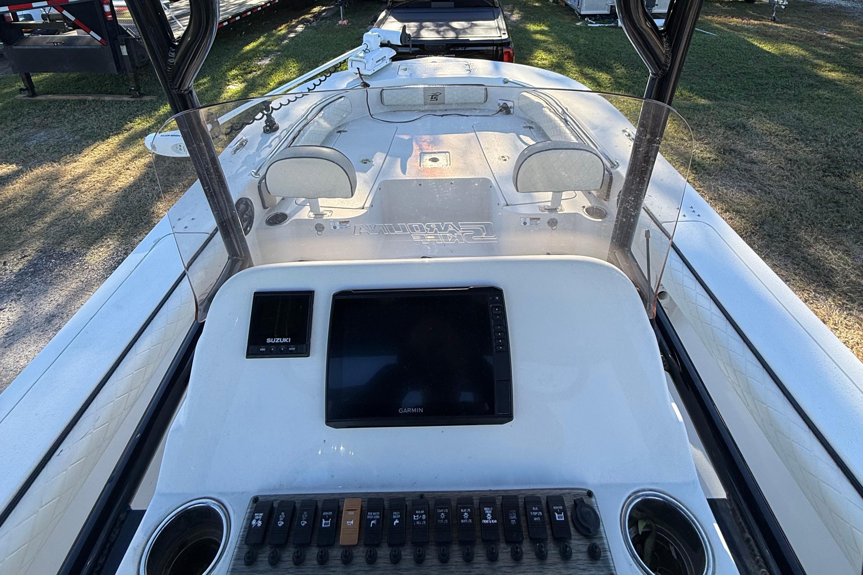 2021 Carolina Skiff 26 Ultra Elite boat dashboard with Garmin display and controls.