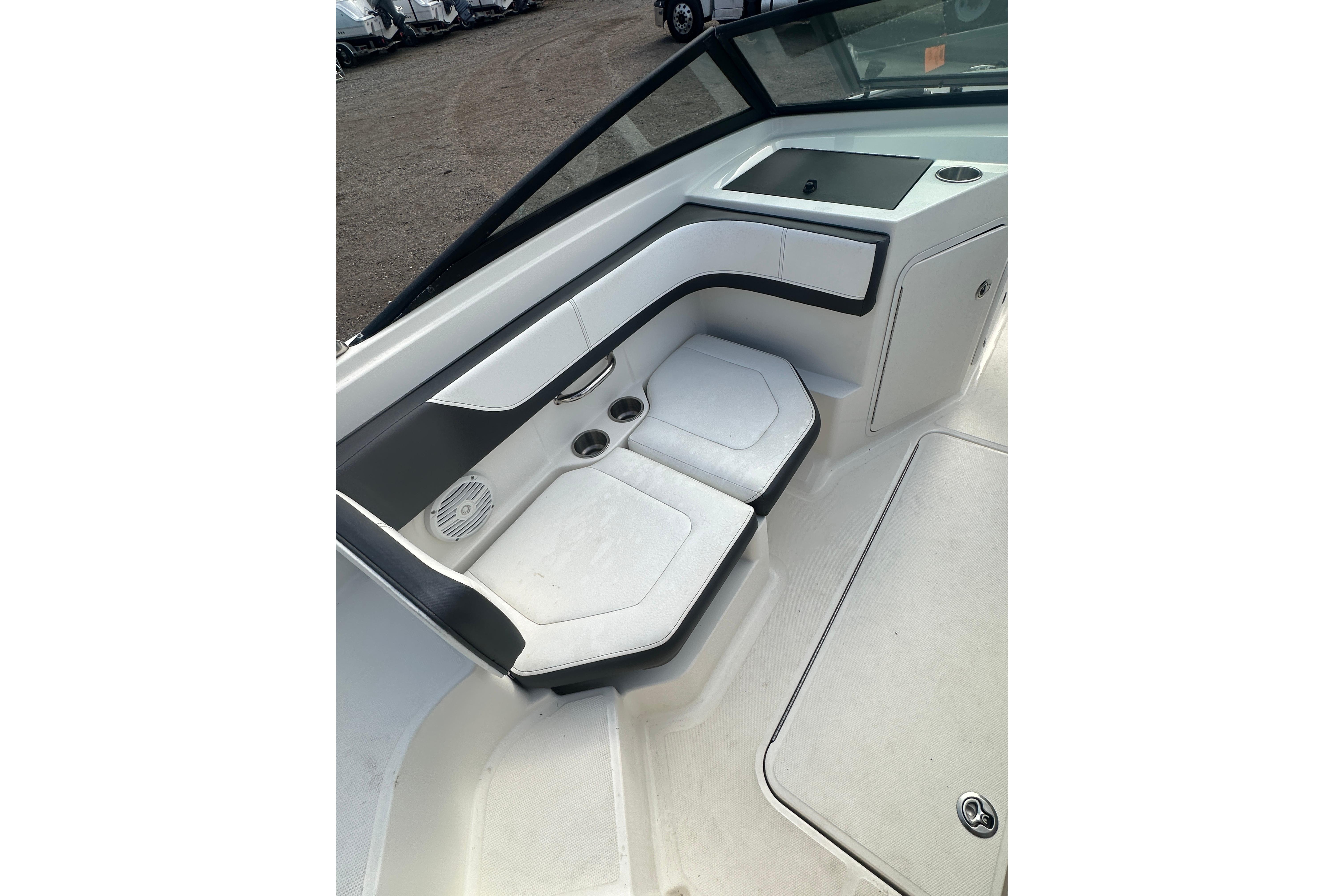 2017 Sea Ray SPX 190 Outboard interior seating with cup holders and storage.