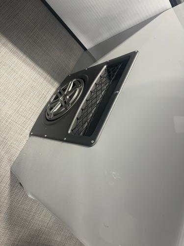 2025 Manitou LX speaker and vent detail on sleek surface.