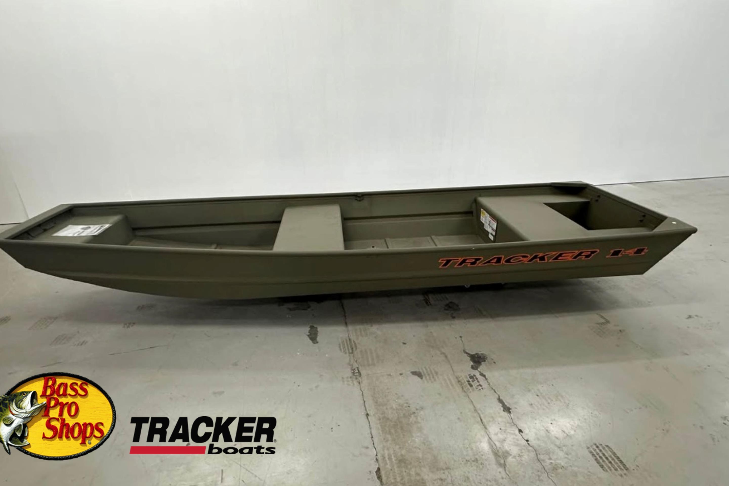 2026 Tracker Grizzly 14 Jon boat displayed at Bass Pro Shops showroom.